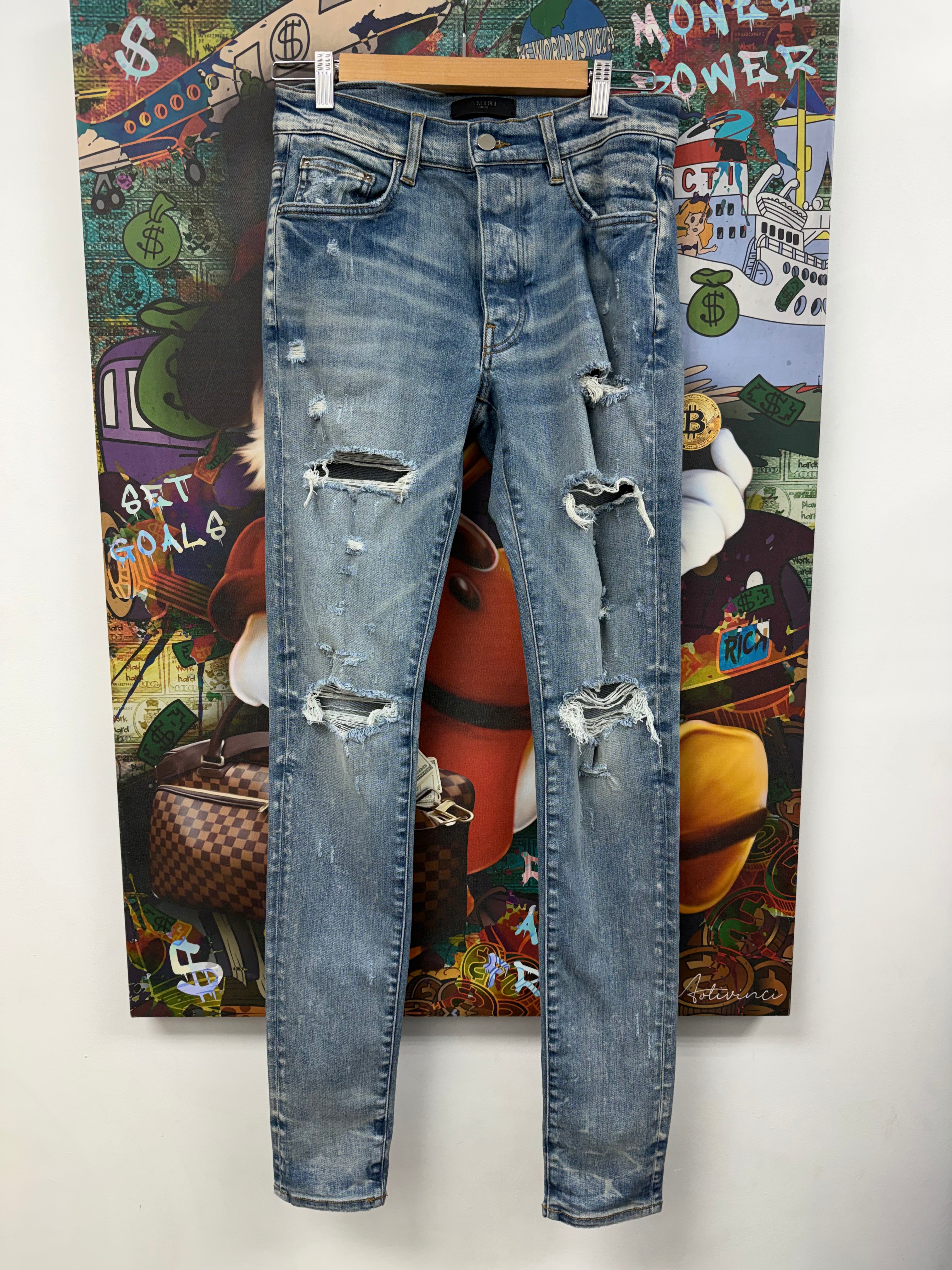 Amiri Light Wash Rip Jeans