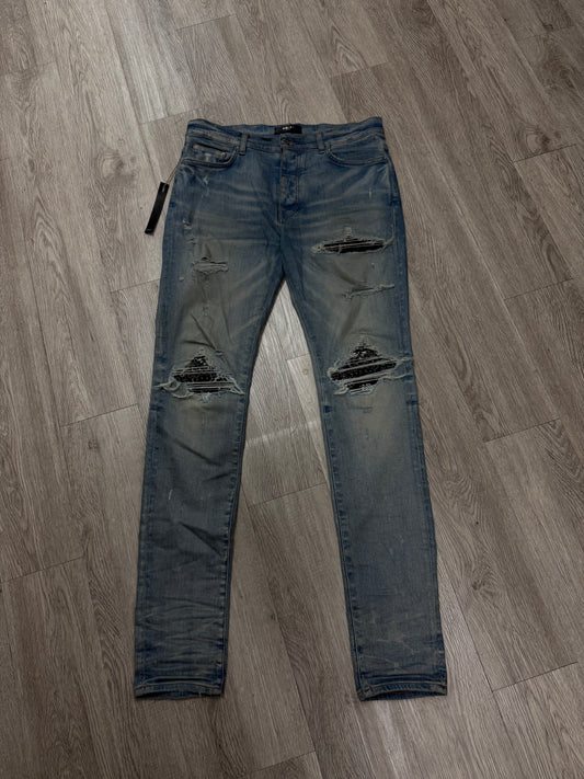 Amiri MX1 Light Wash Black Paisley Patch Jeans