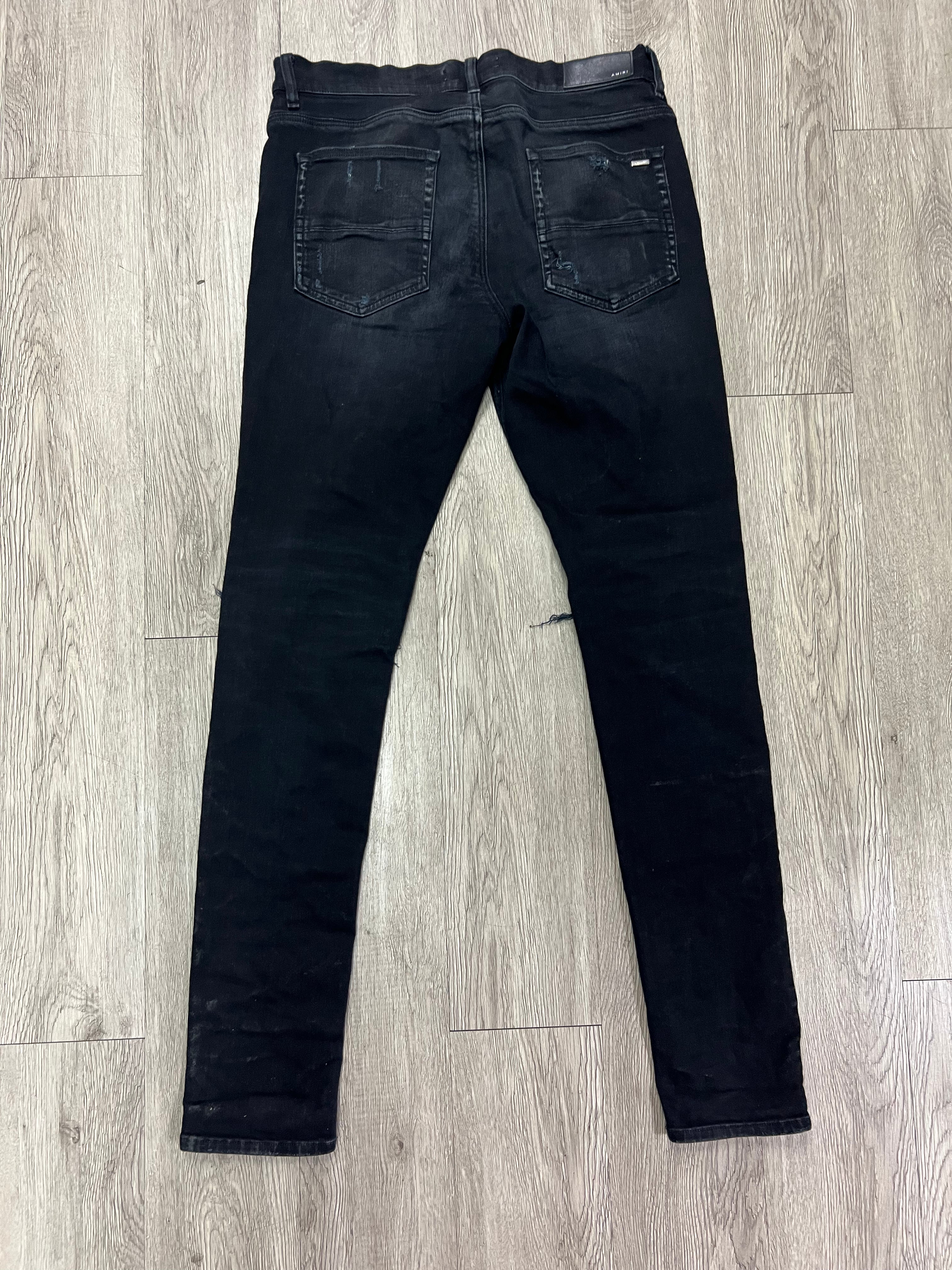 Amiri MX1 Black Wash Camo Patch Jeans