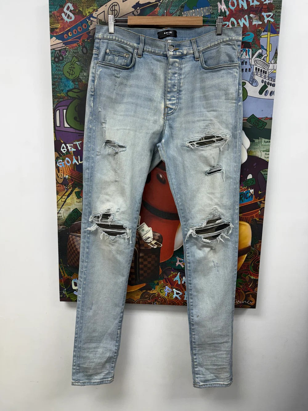 Amiri MX1 Camo Patch Light Wash Jeans