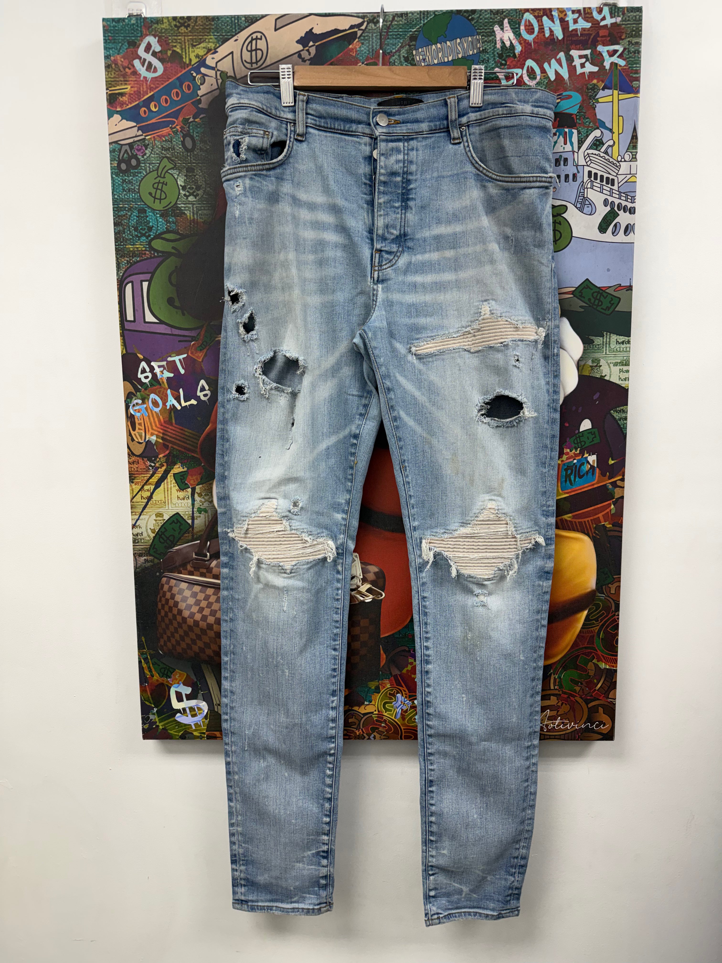 Amiri MX1 Light Wash Ultra Suede White Patch Jeans