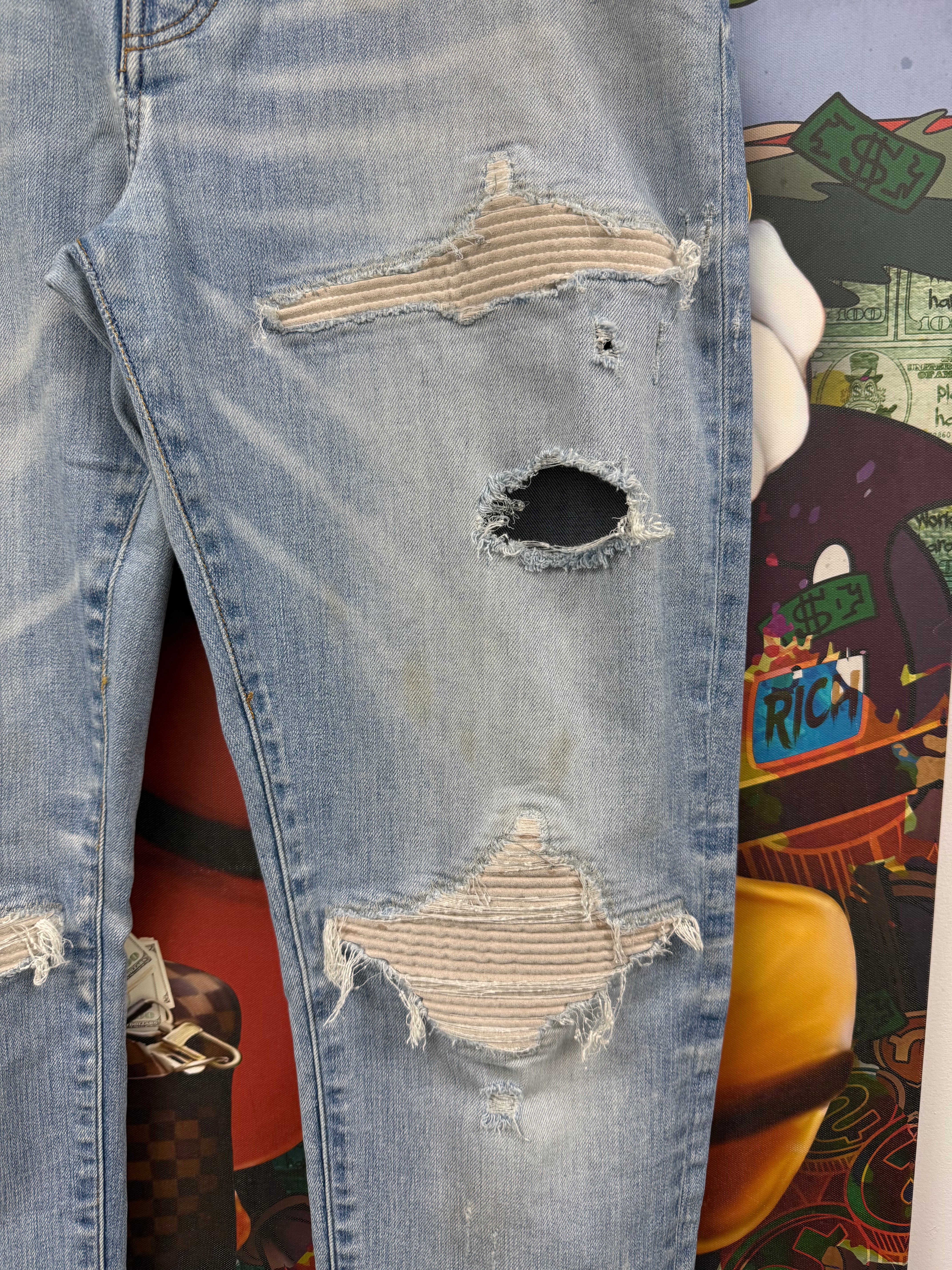 Amiri MX1 Light Wash Ultra Suede White Patch Jeans