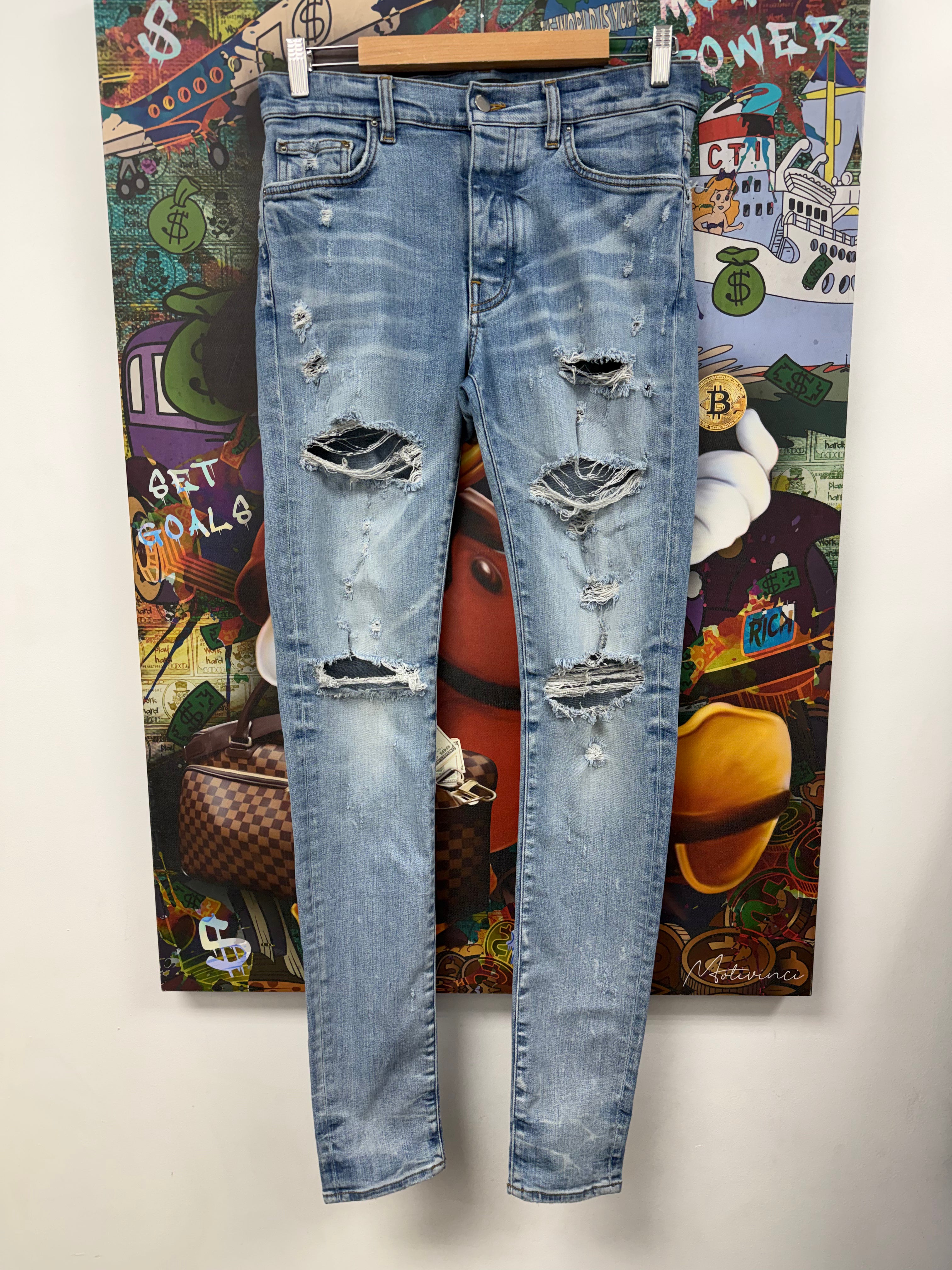 Amiri Light Wash Rip Jeans