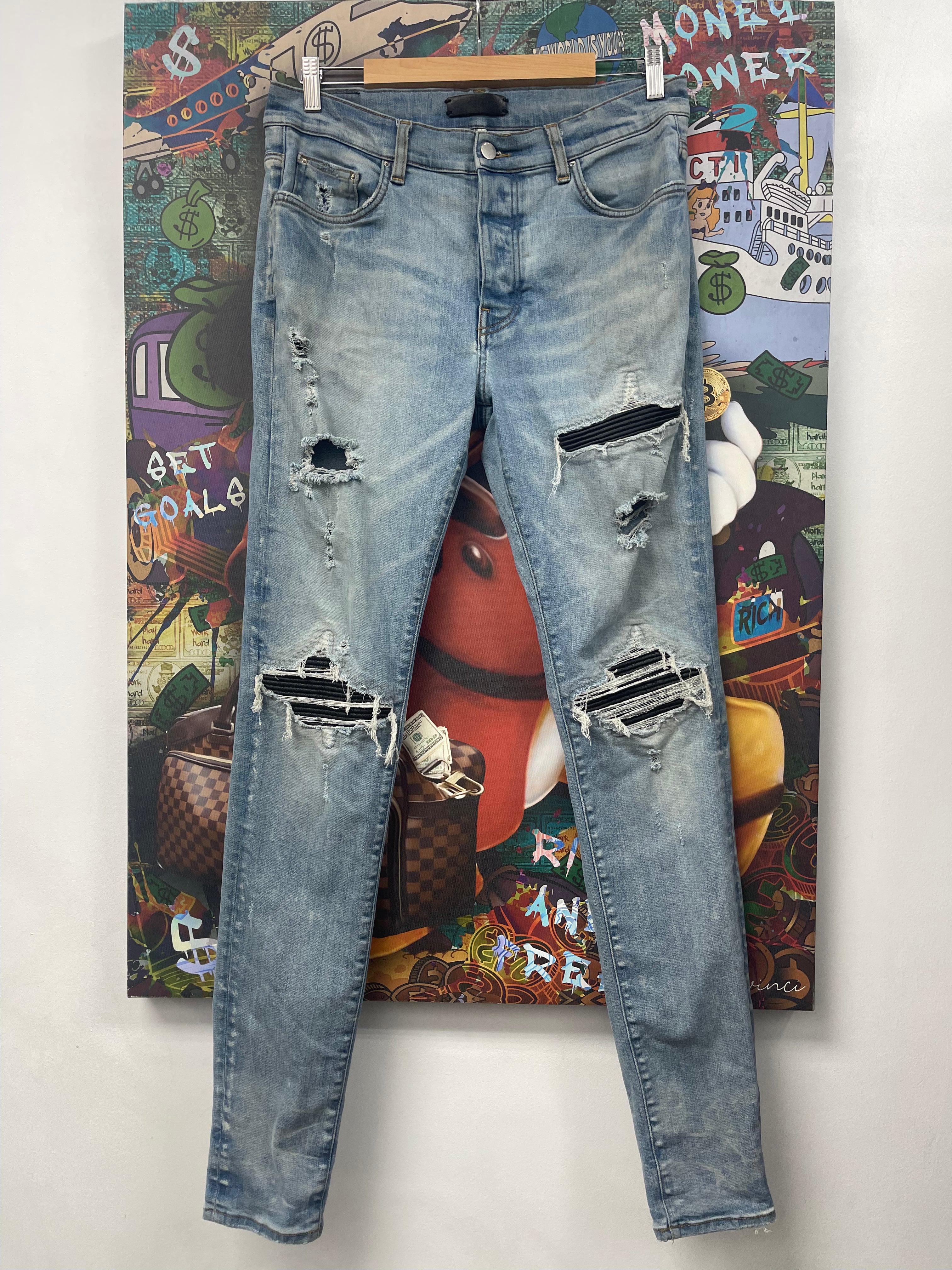 Amiri MX1 Light Wash Black Patch Jeans