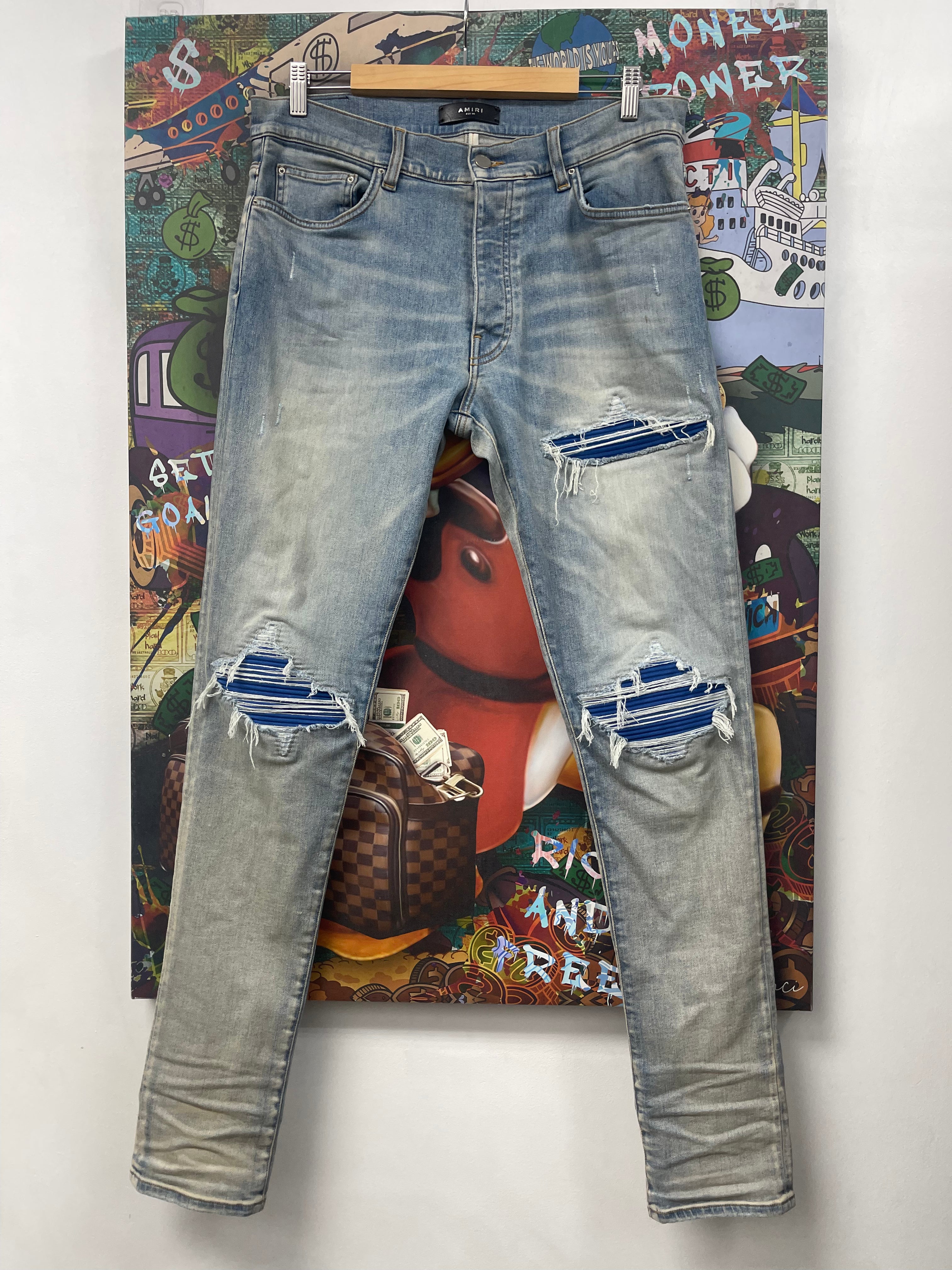 Amiri MX1 Light Wash Blue Suede Patch Jeans