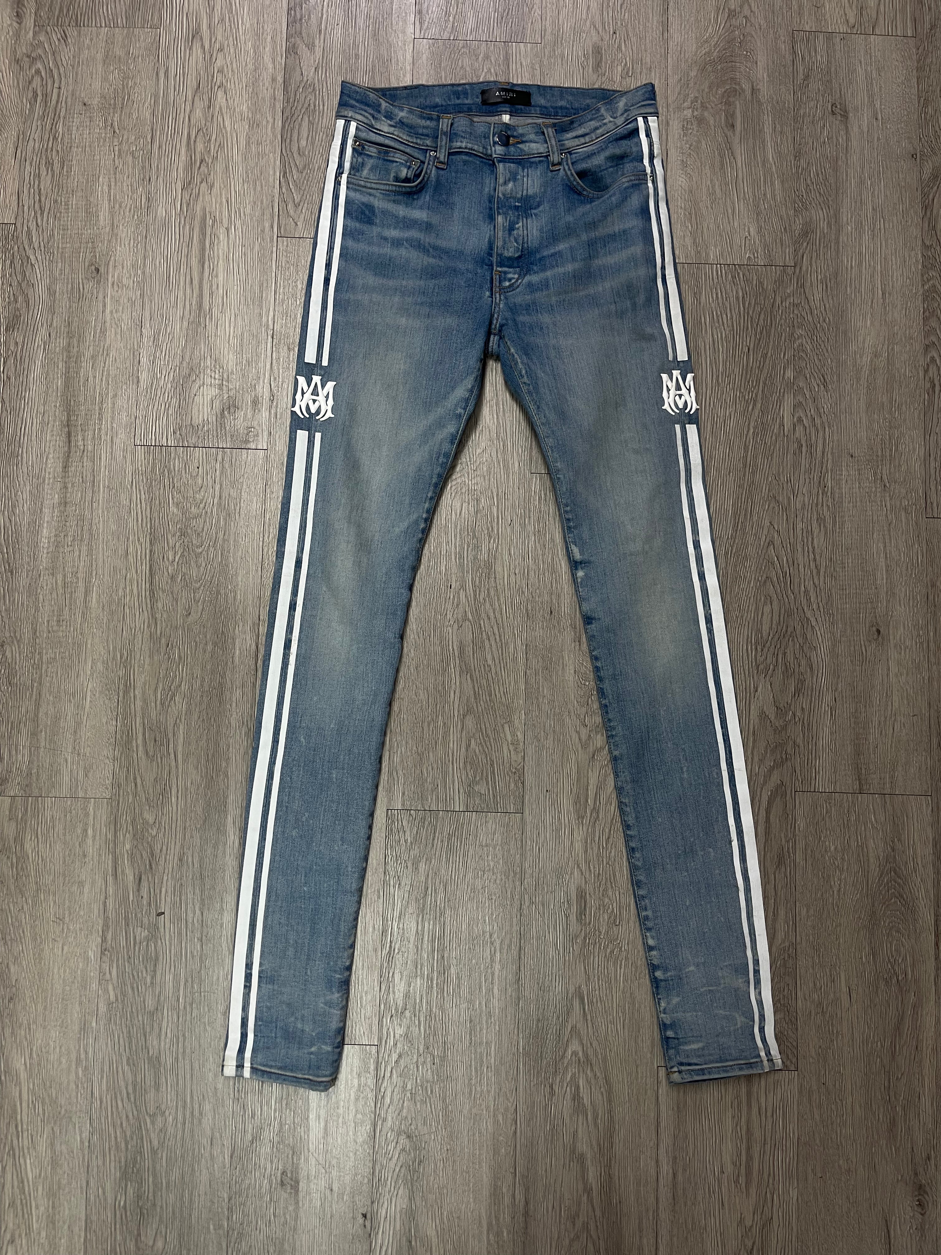 Amiri Light Wash White MA Track Jeans