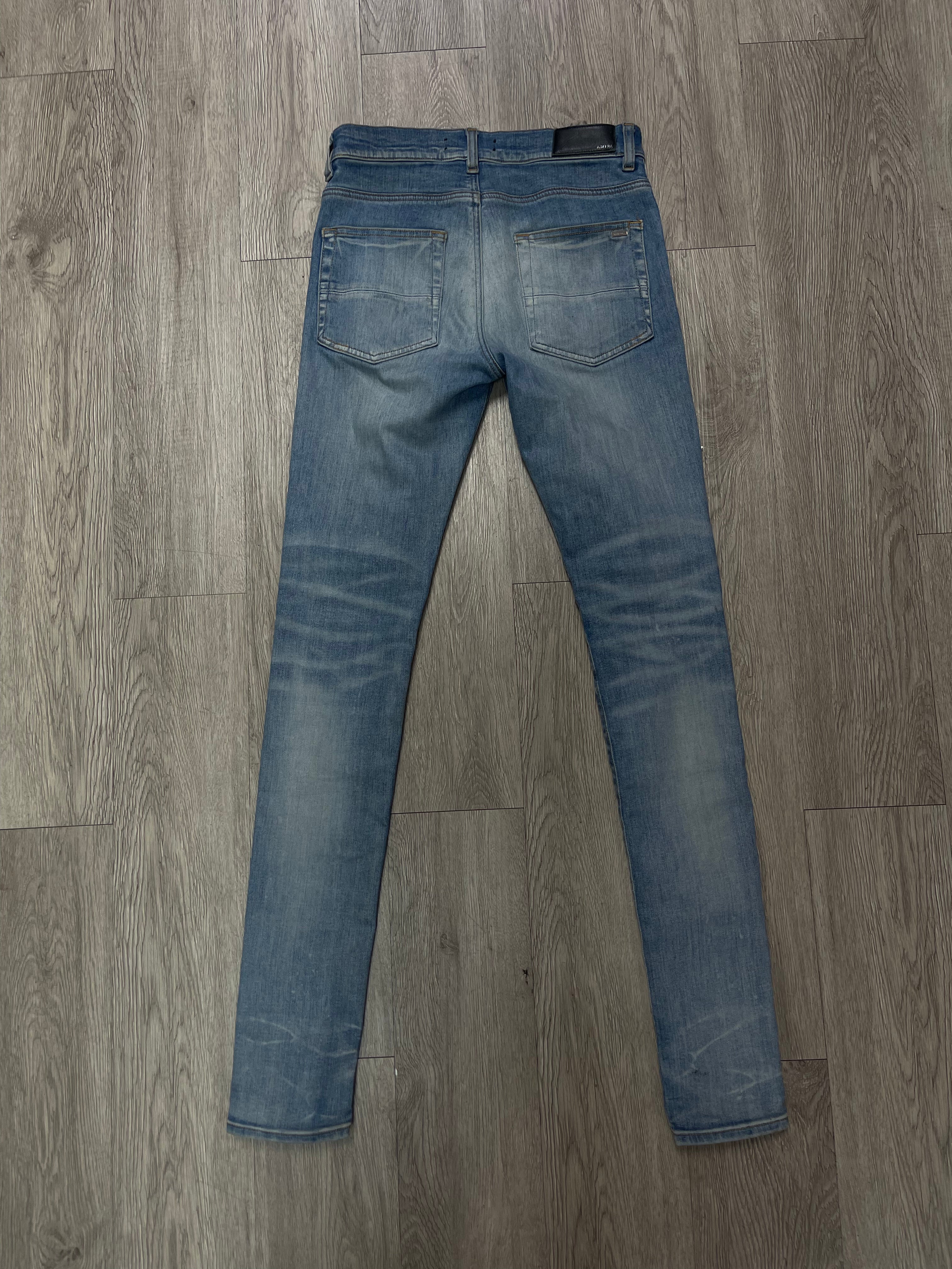 Amiri Light Wash White MA Track Jeans