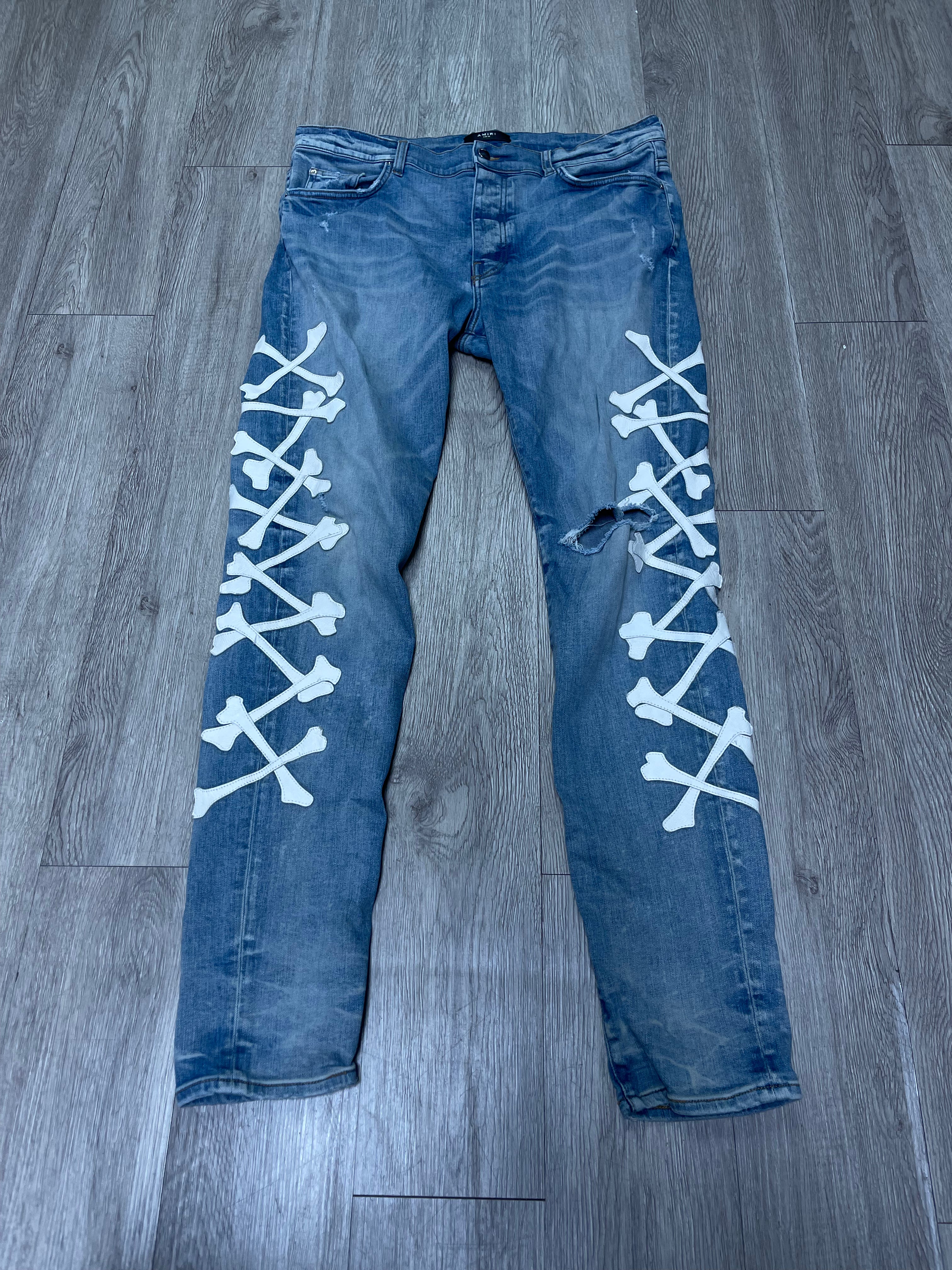 Amiri Light Wash White Bones Jeans