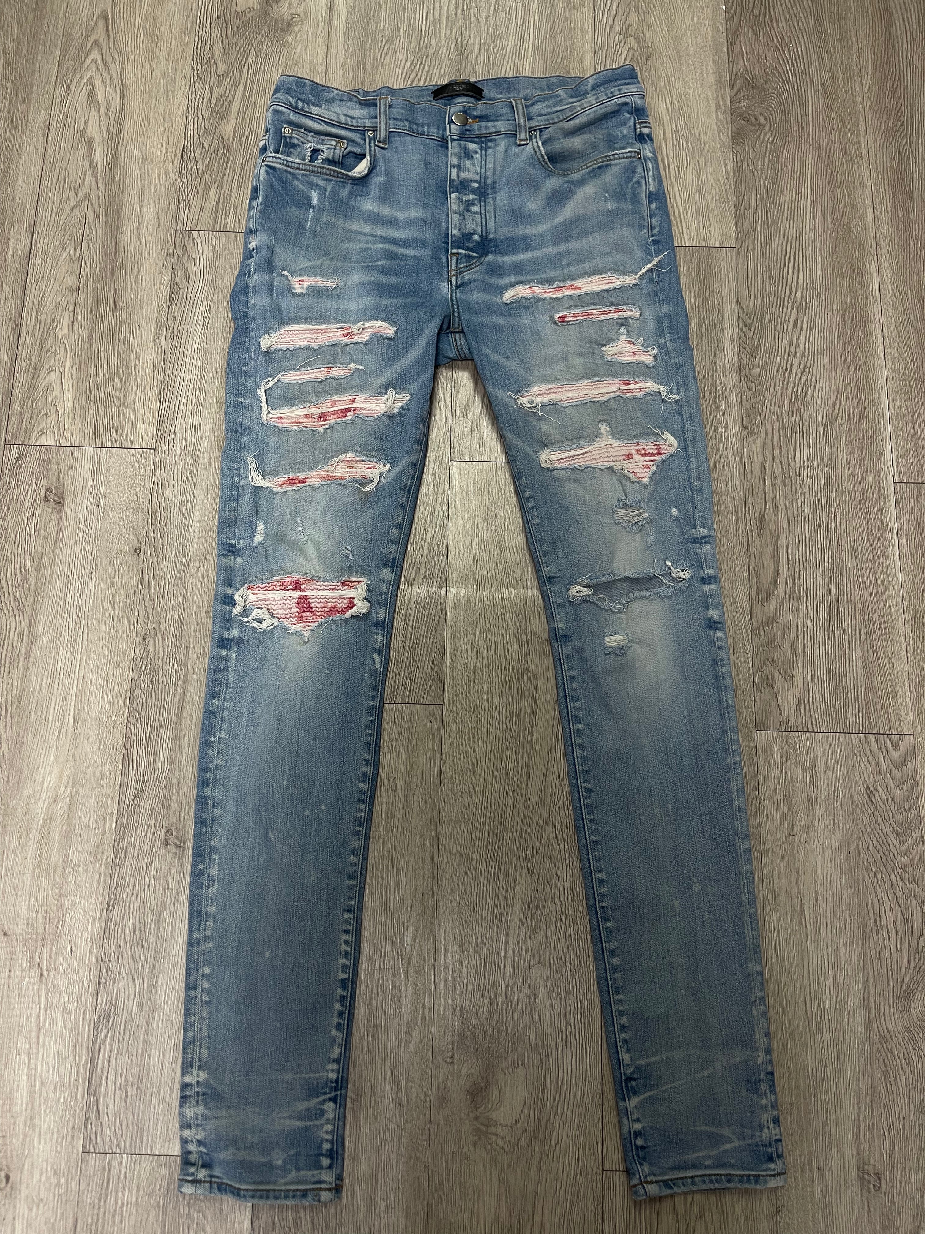 Amiri Light Wash Pink Tie Dye Thrasher Jeans