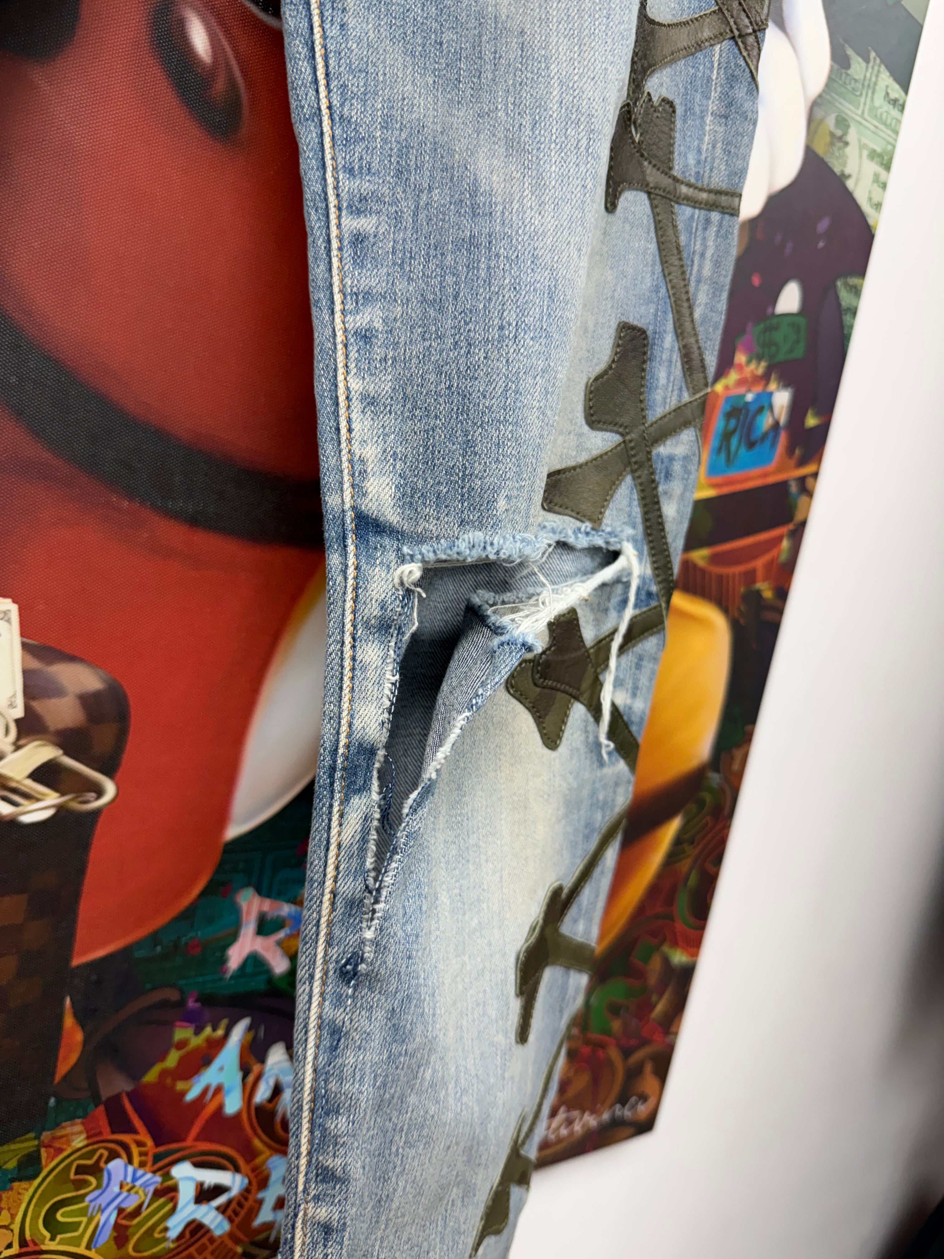 Amiri Light Wash Camo Bones Jeans