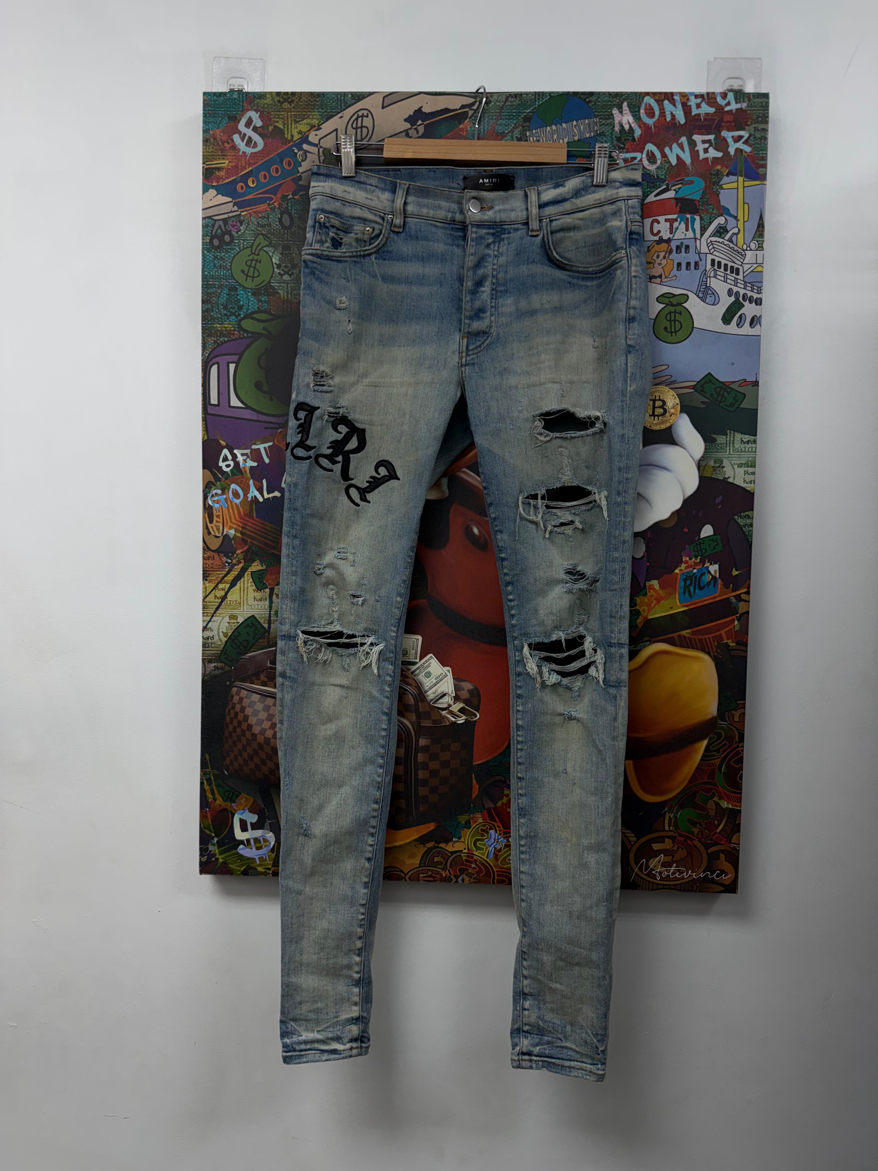 Amiri Light Wash Old English Jeans