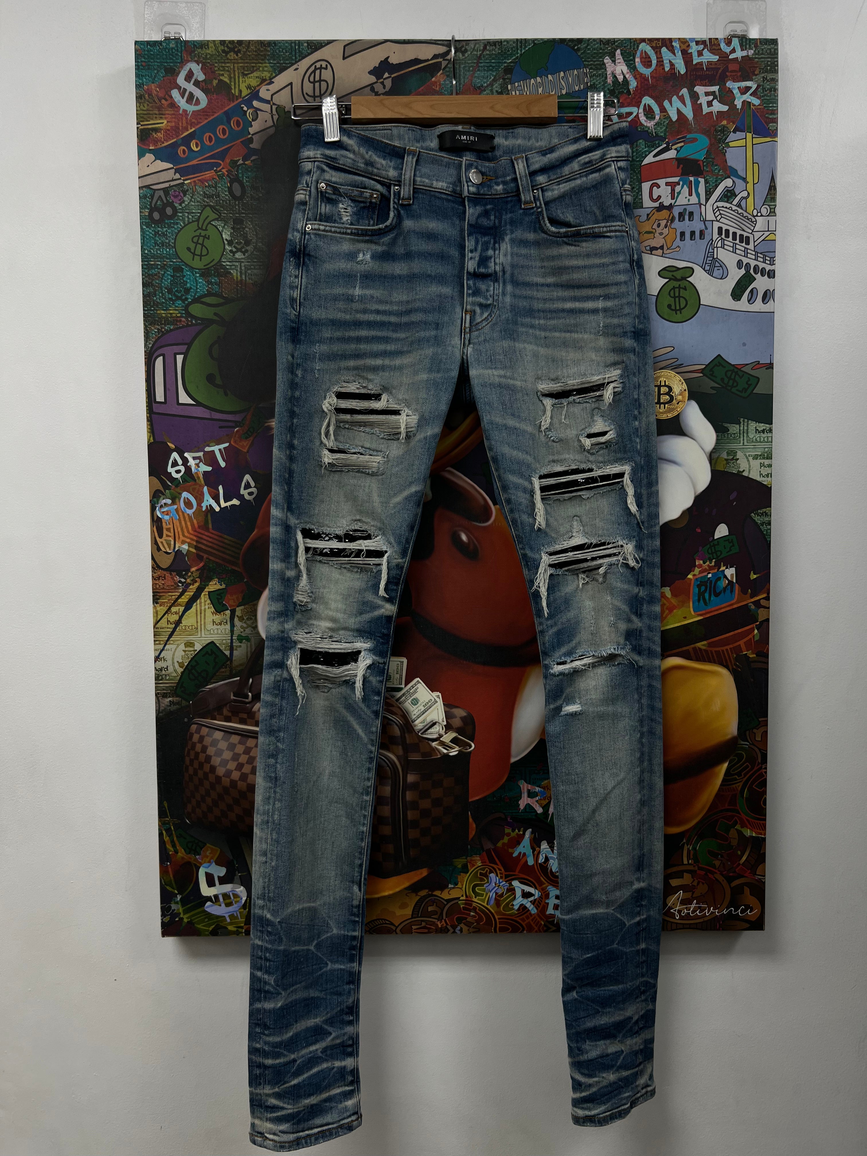 Amiri Light Wash Black Sequin Thrasher Patch Jeans