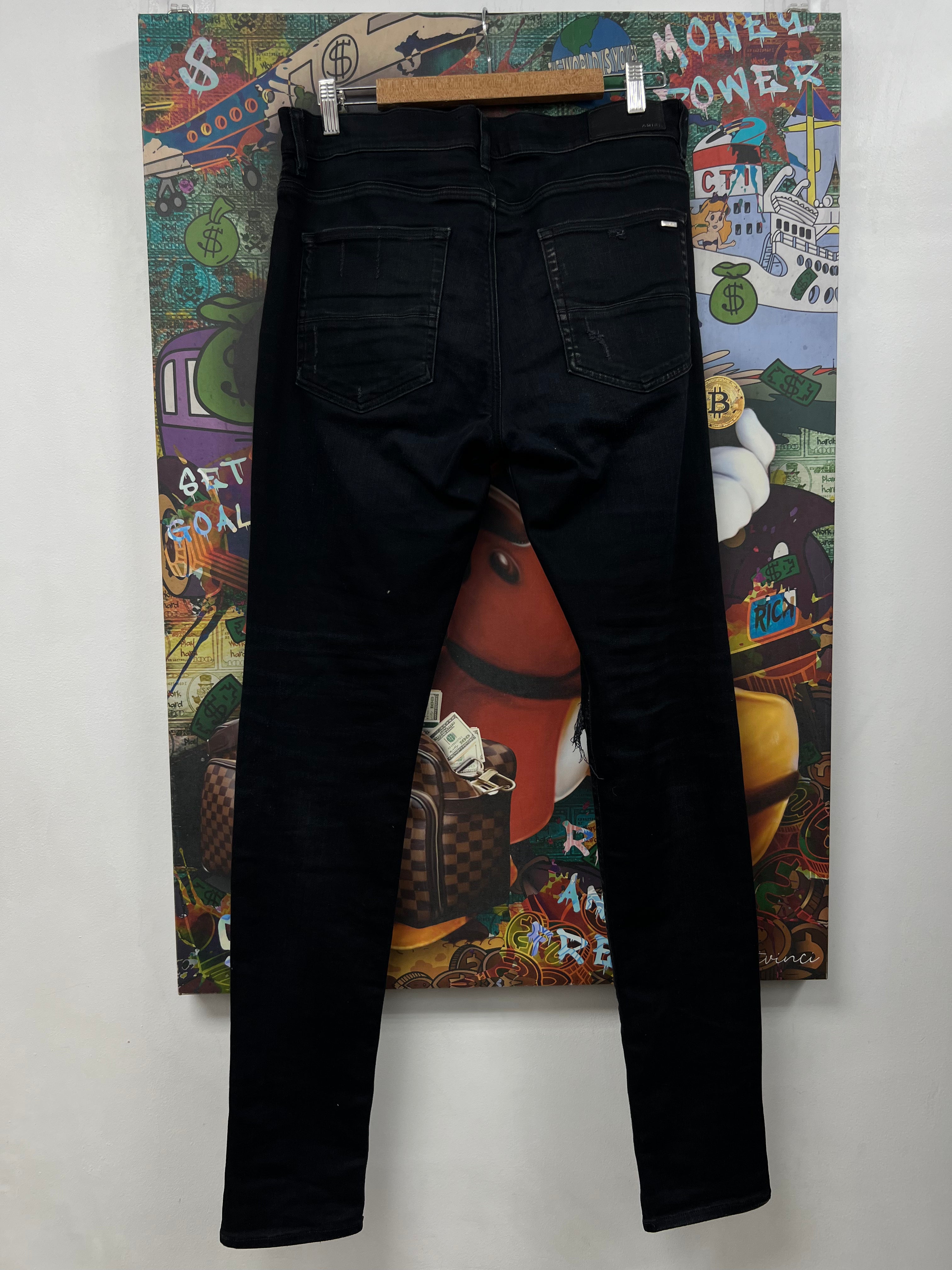 Amiri MX1 Black Wash Camo Patch Jeans