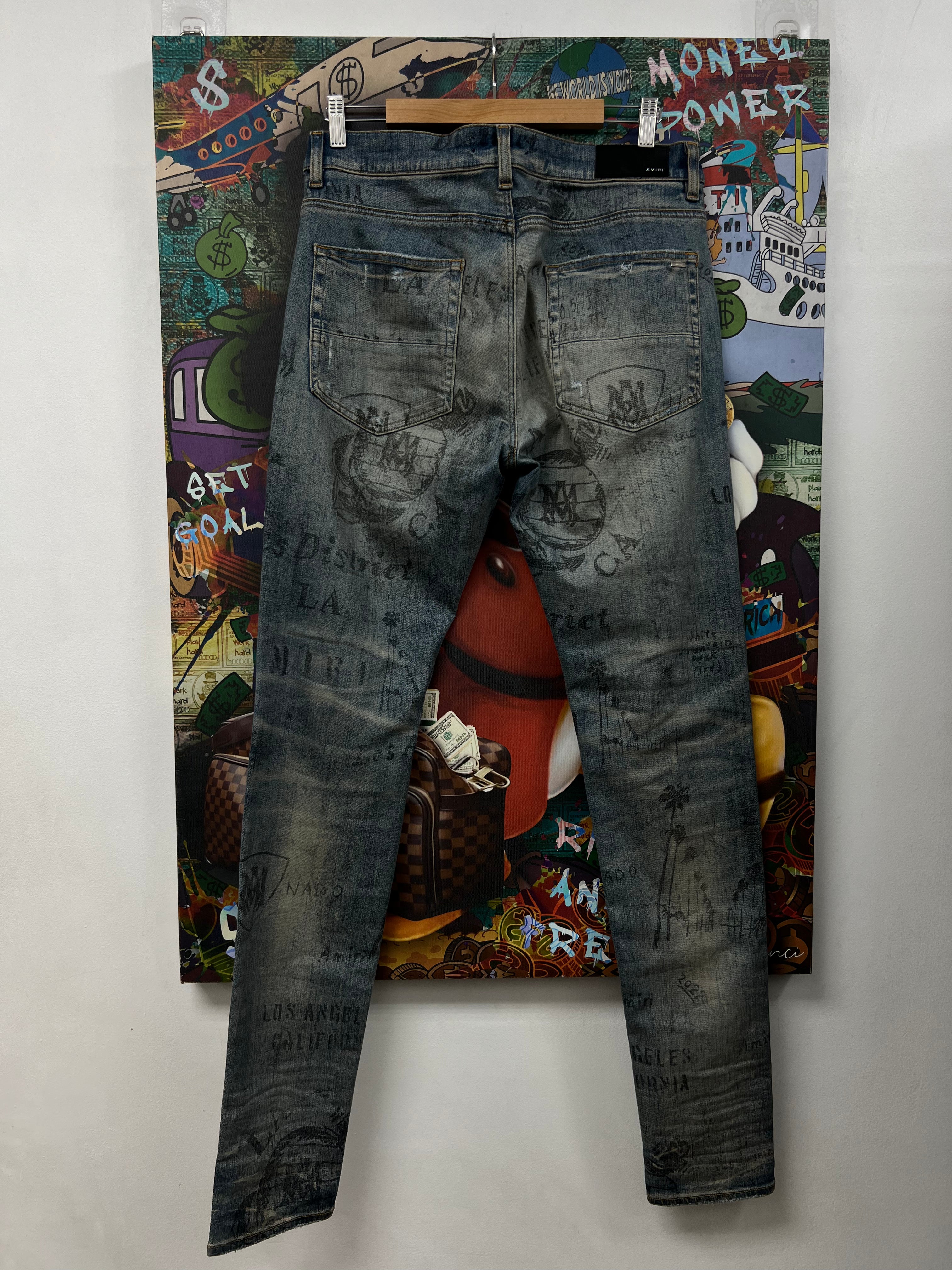 Amiri Light Wash Stencil Jeans
