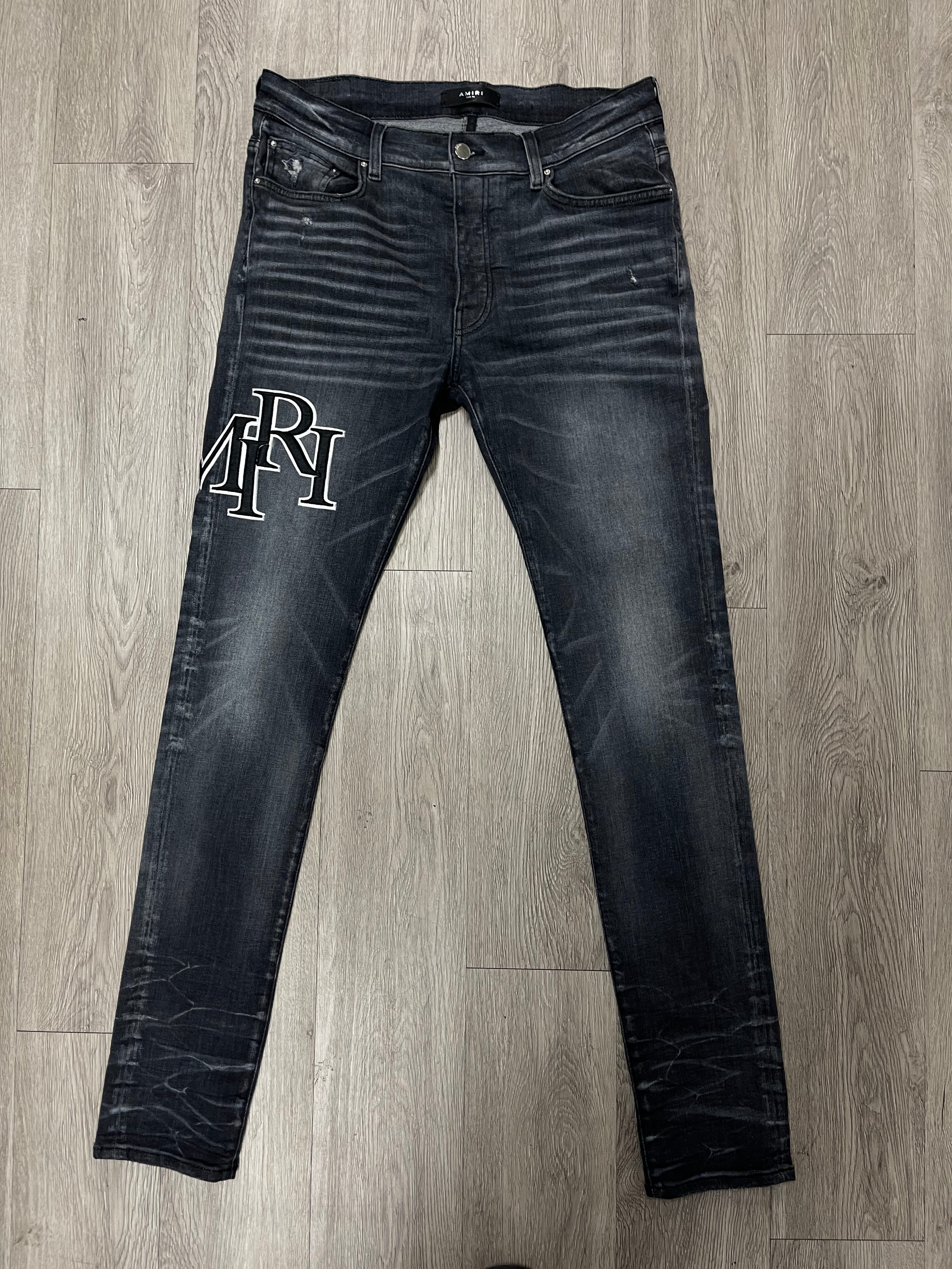 Amiri Grey Staggered Logo Jeans