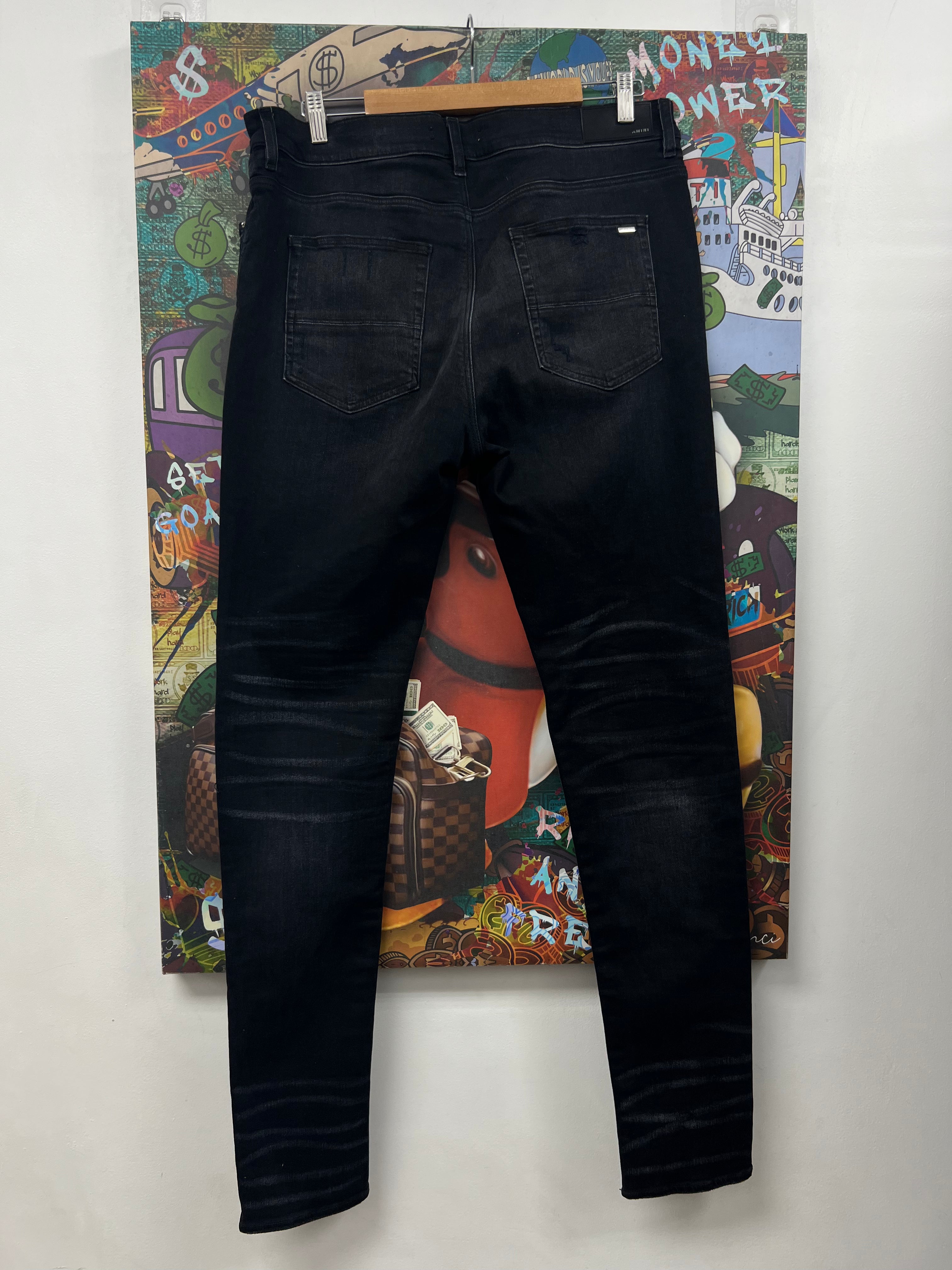 Amiri MX1 Black Wash Blue Crackle Patch Jeans