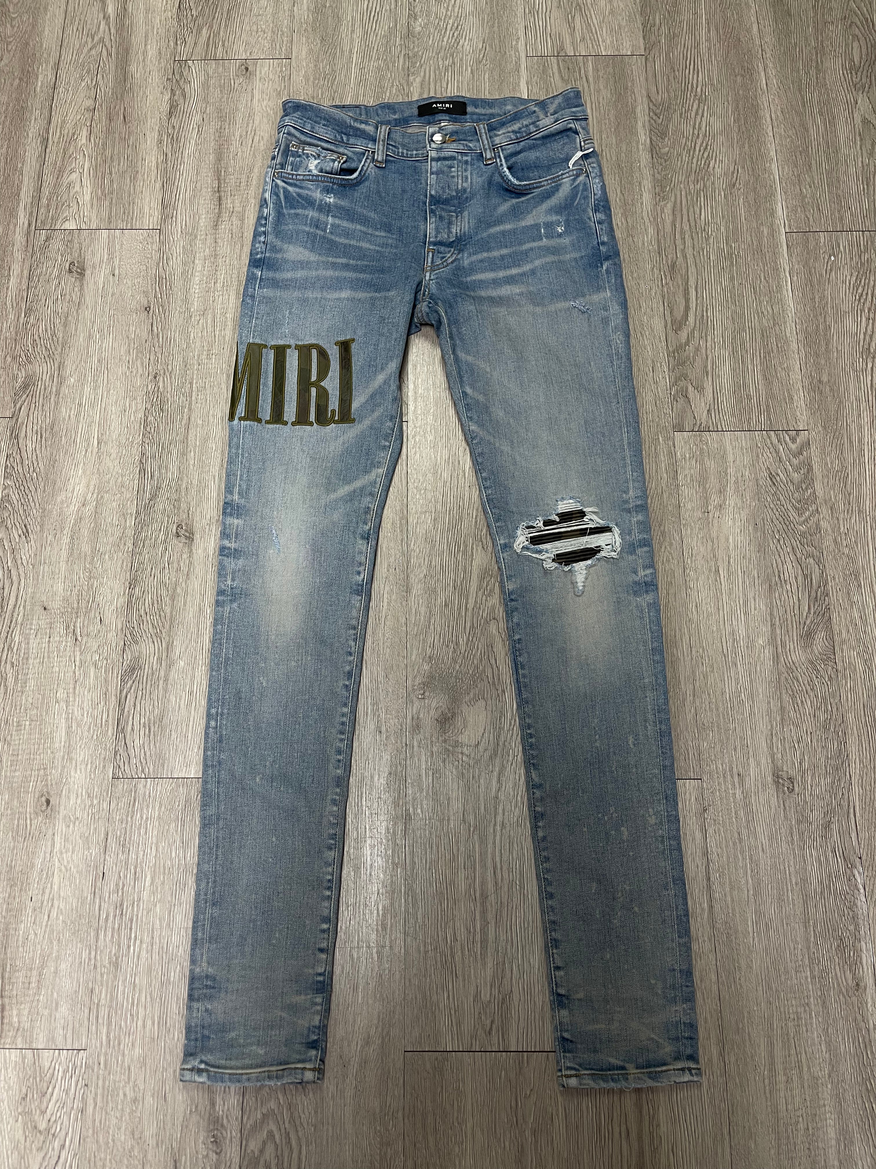 Amiri Light Wash Camo Side Logo Jeans
