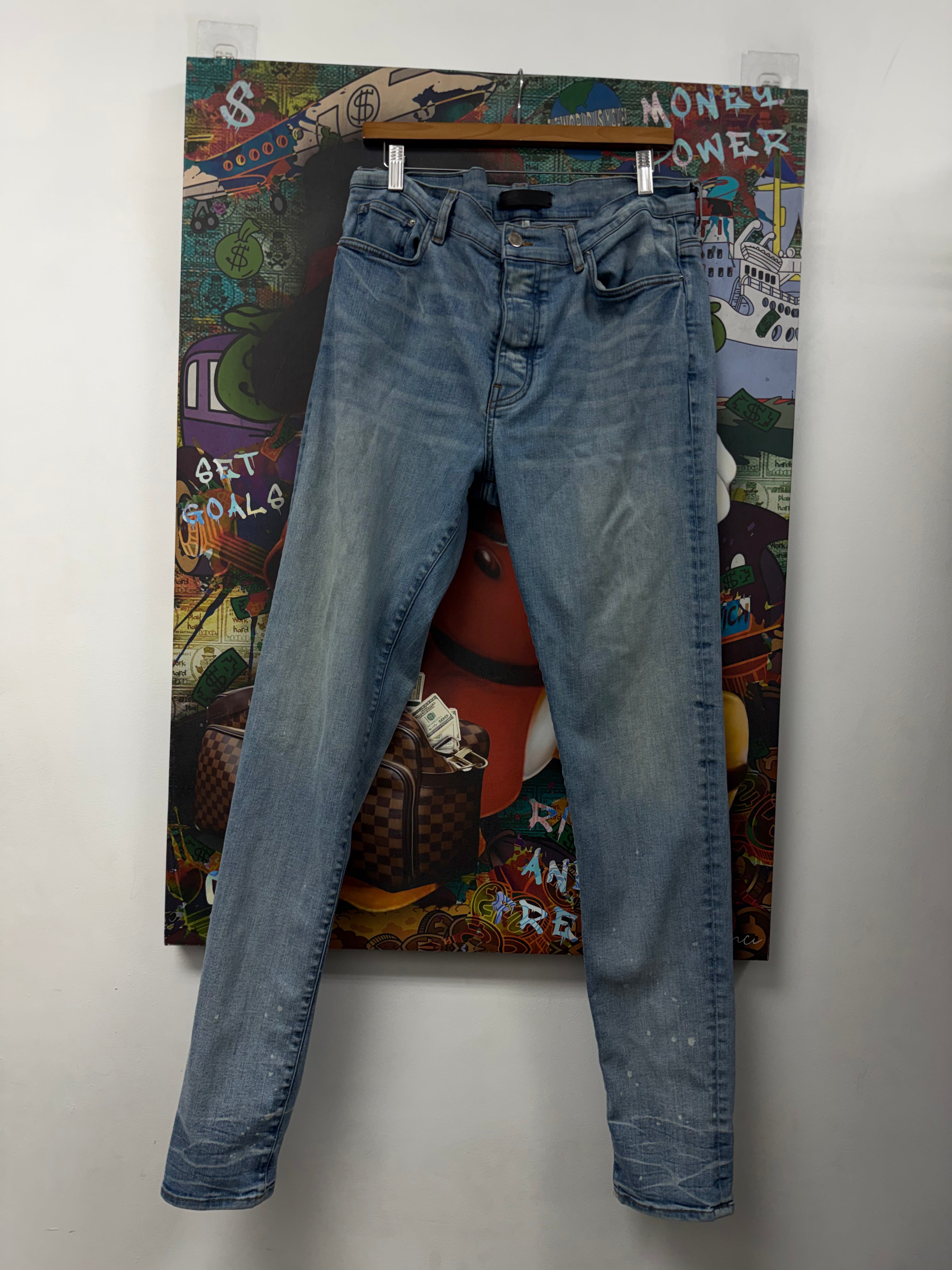 Amiri Light Wash Staggered Baby Blue Jeans