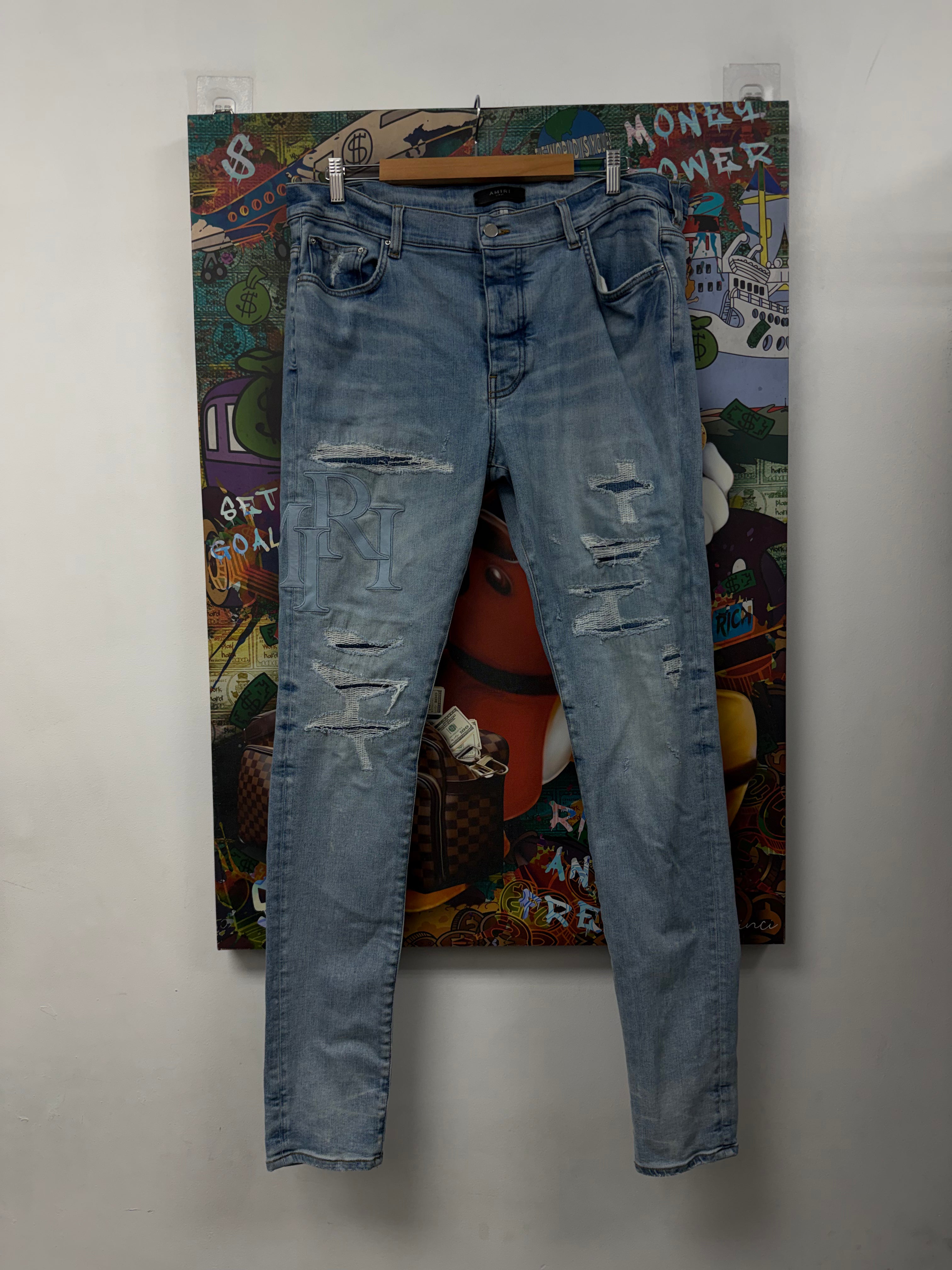 Amiri Light Wash Staggered Baby Blue Jeans