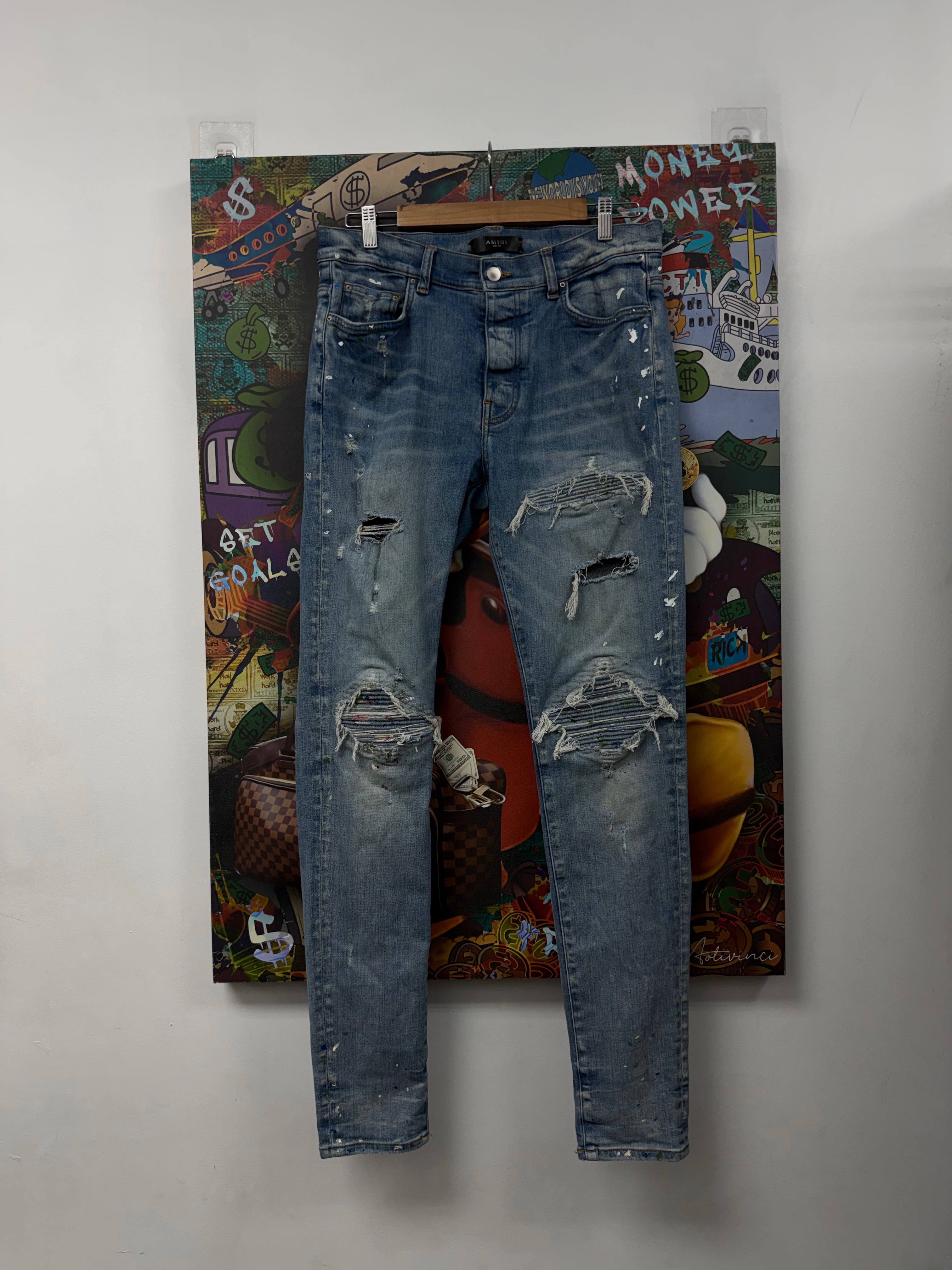 Amiri MX1 Light Wash Denim Splatter Patch Jeans