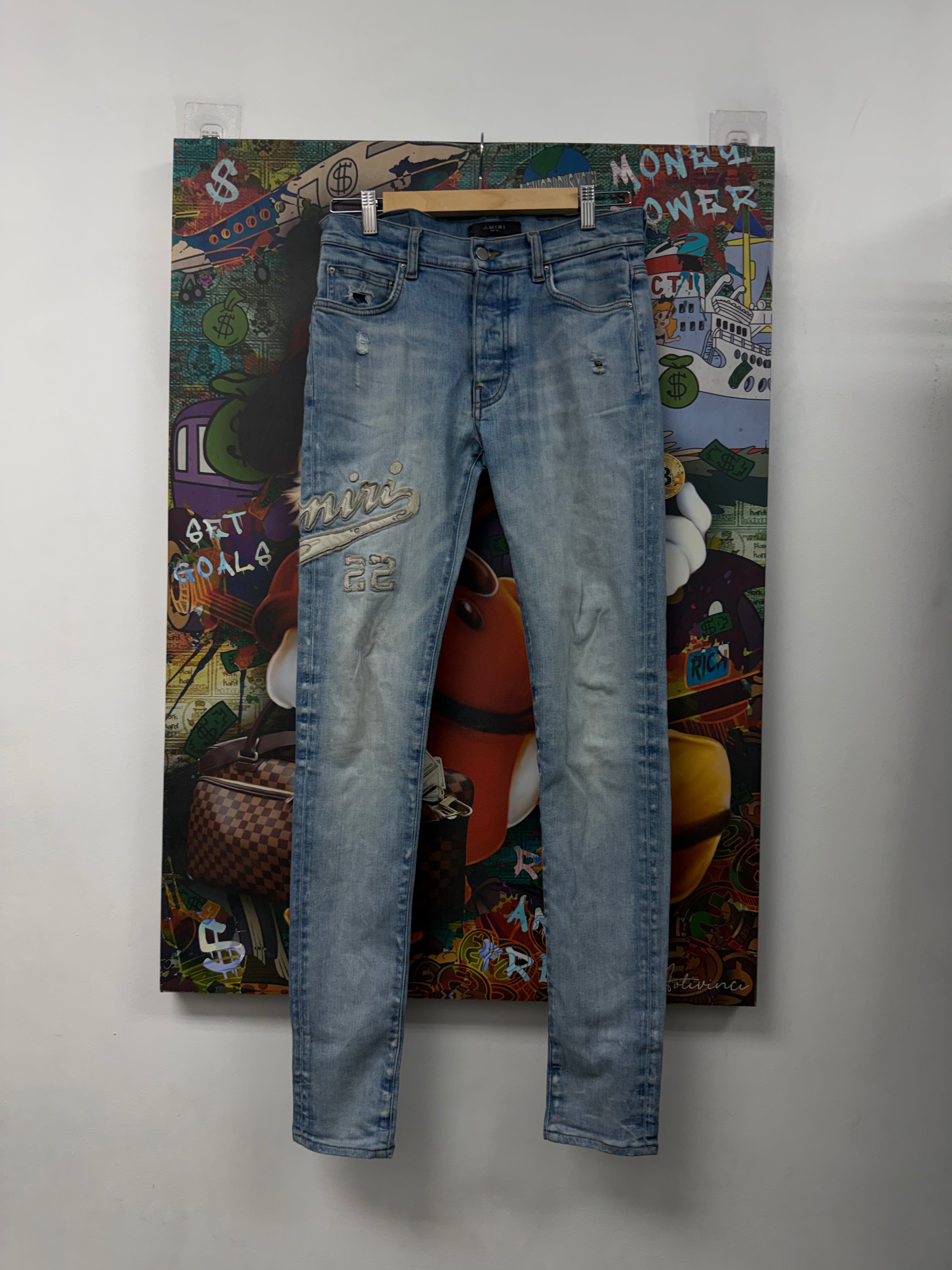 Amiri Light Wash Cream 22 Patch Jeans