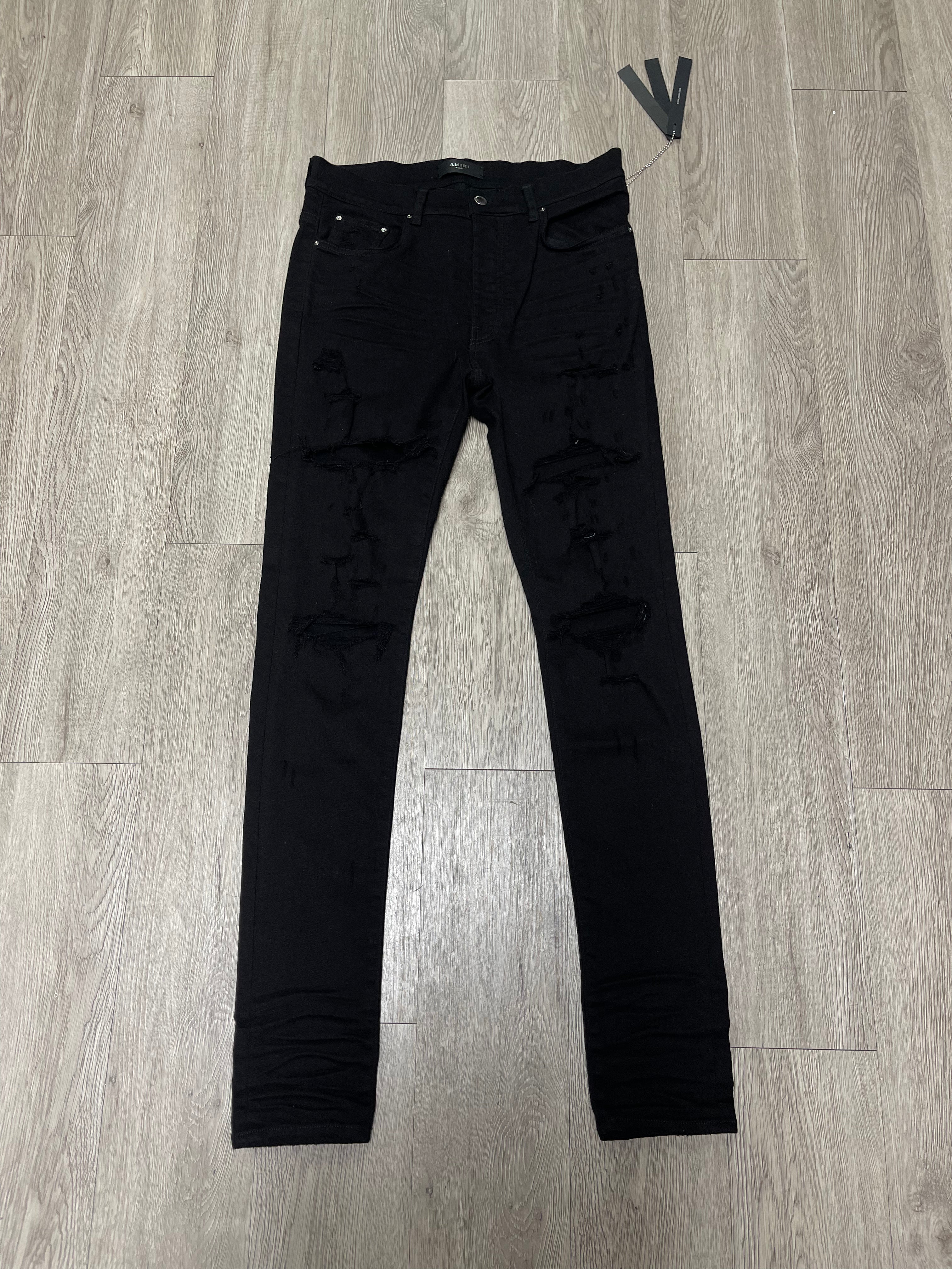 Amiri Black Ripped Thrasher Jeans