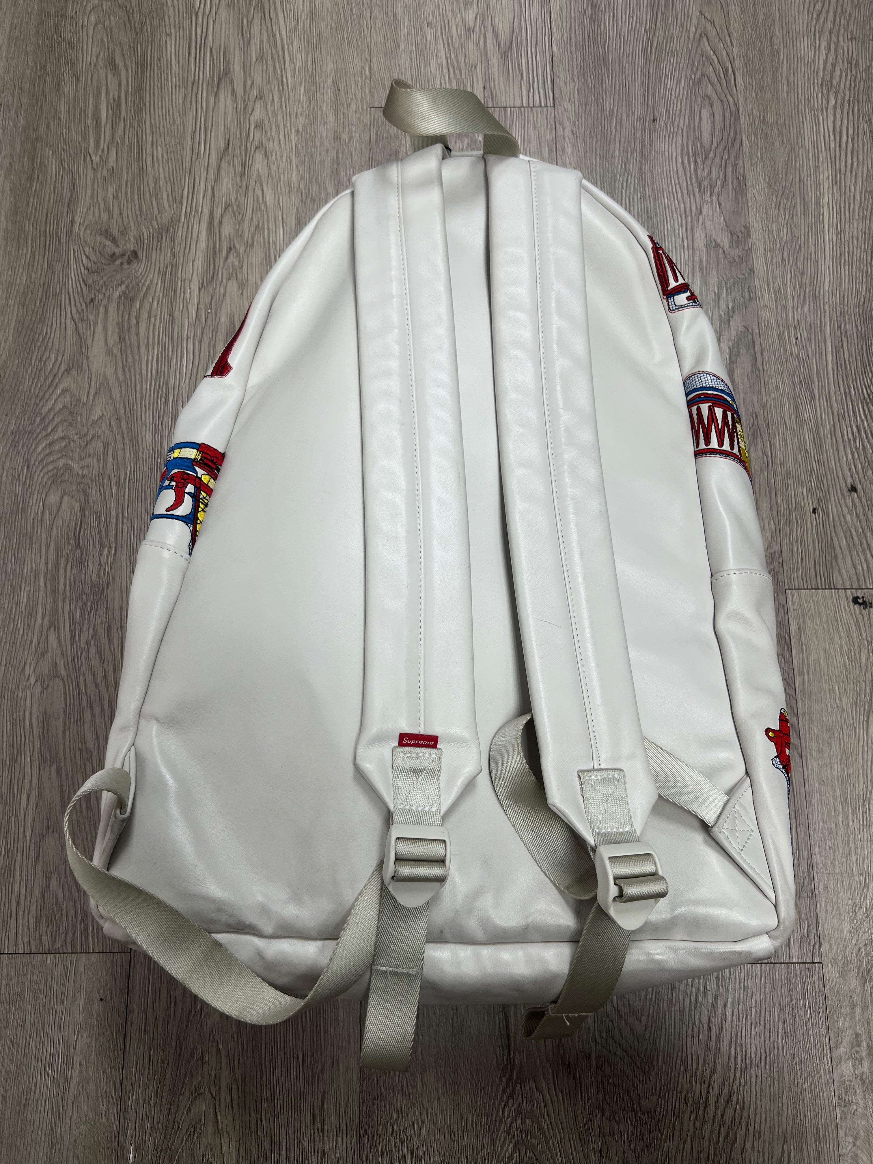 Supreme White Embroidered Guns Backpack