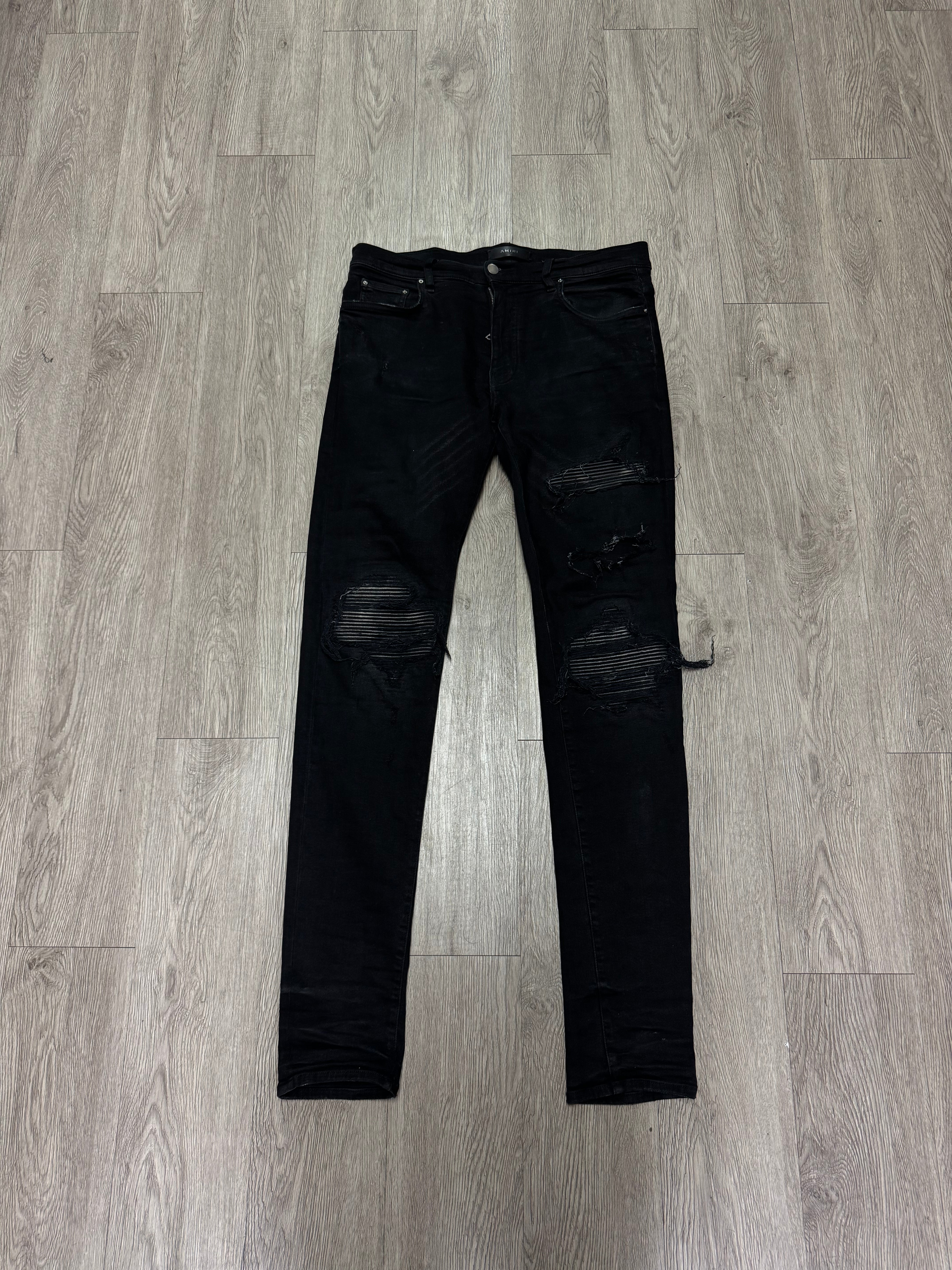 Amiri MX1 Faded Black Patch Jeans