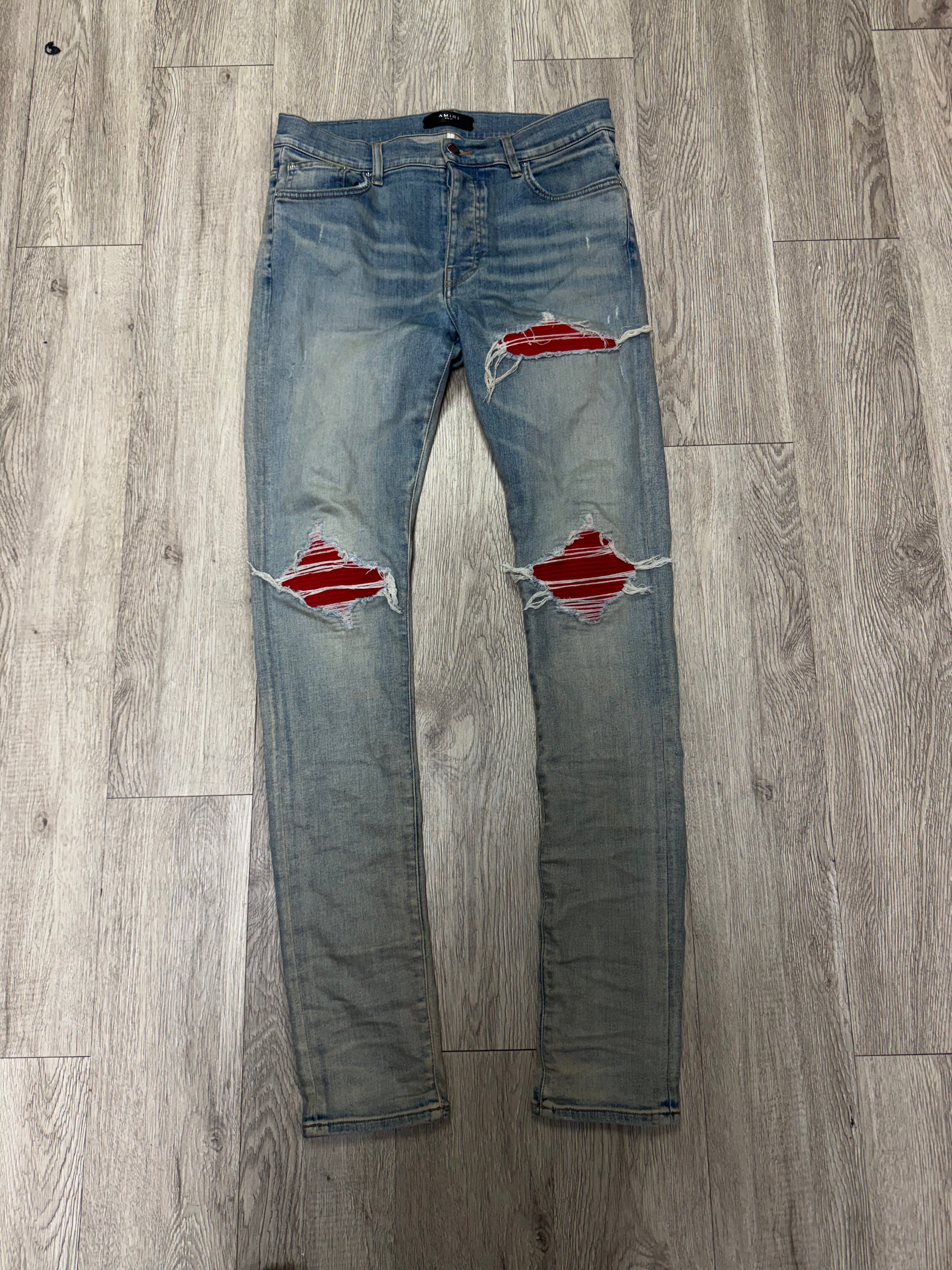 Amiri MX1 Light Wash Red Patch Jeans