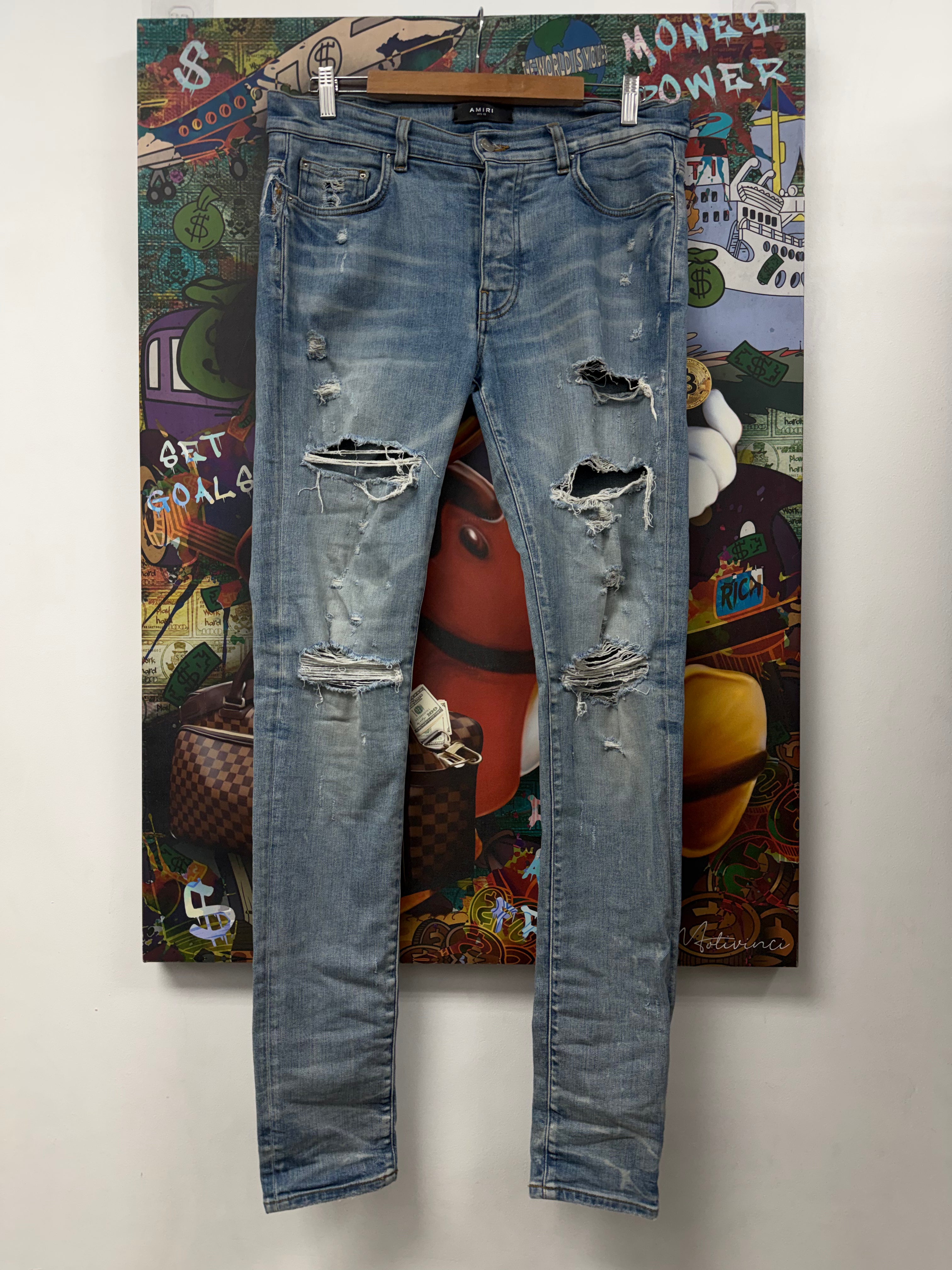 Amiri Light Wash Plain Thrasher Ripped Jeans