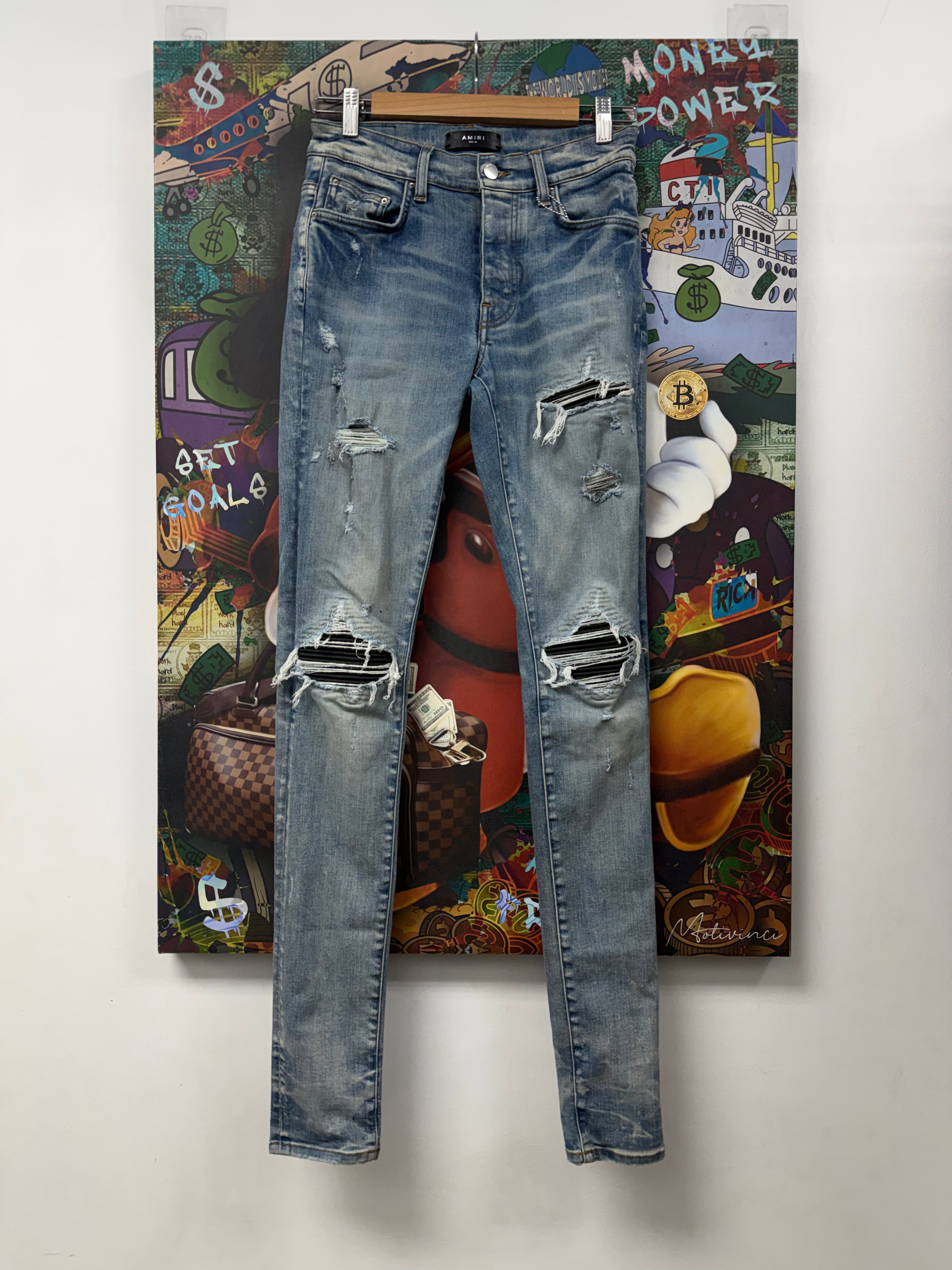 Amiri MX1 Light Wash Black Leather Patch Jeans