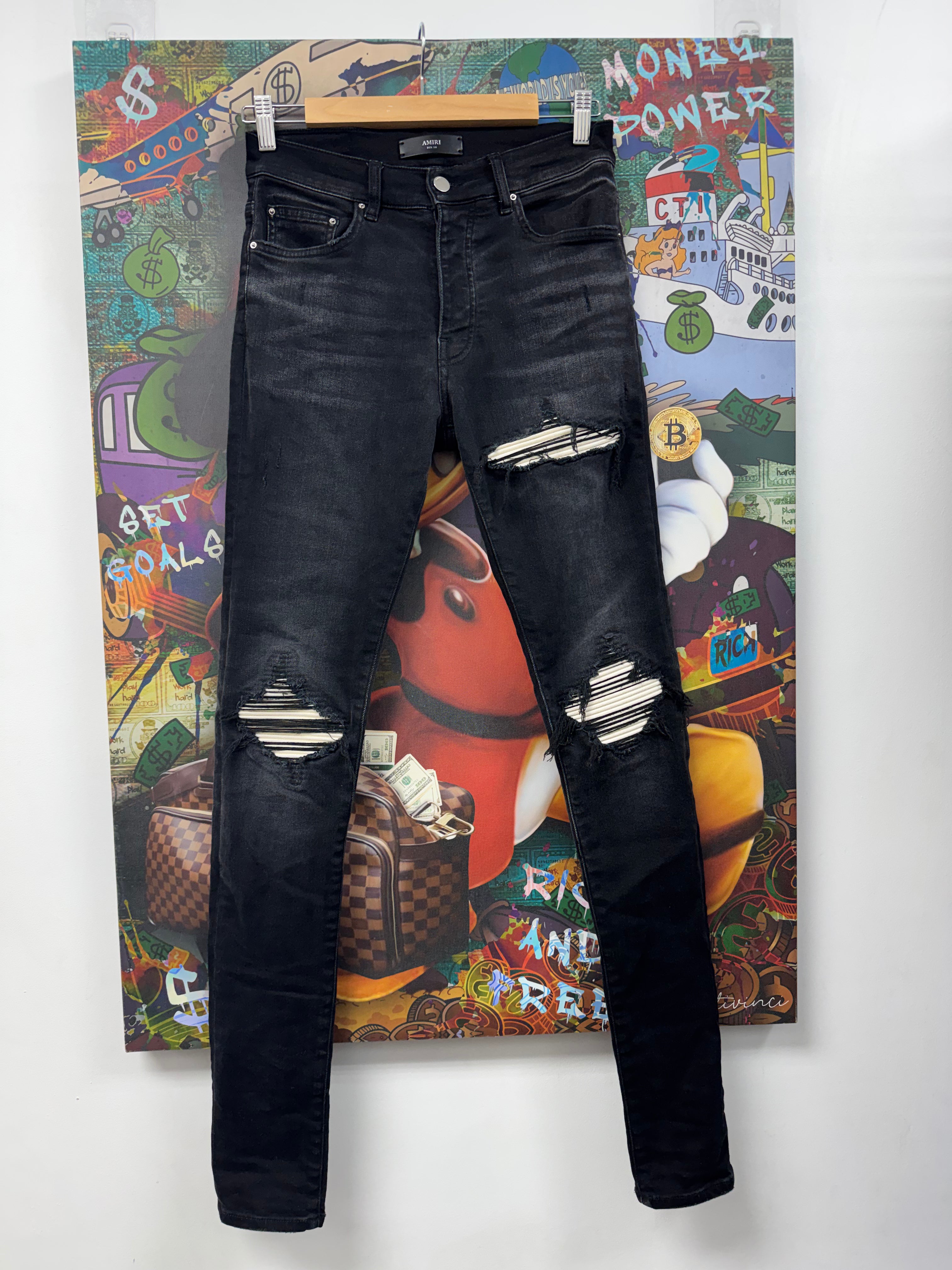 Amiri MX1 Black Wash White Patch Jeans