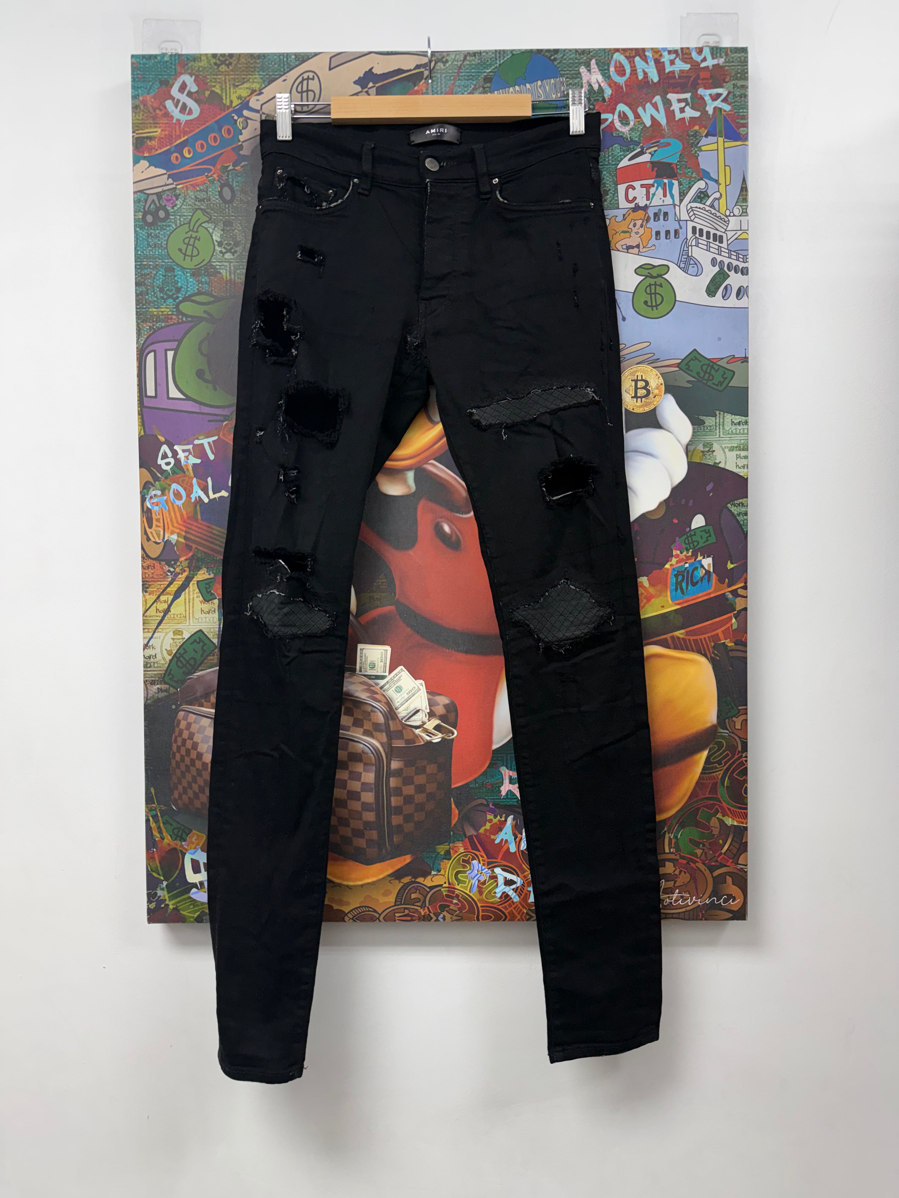 Amiri MX1 Black Quilt Patch Jeans