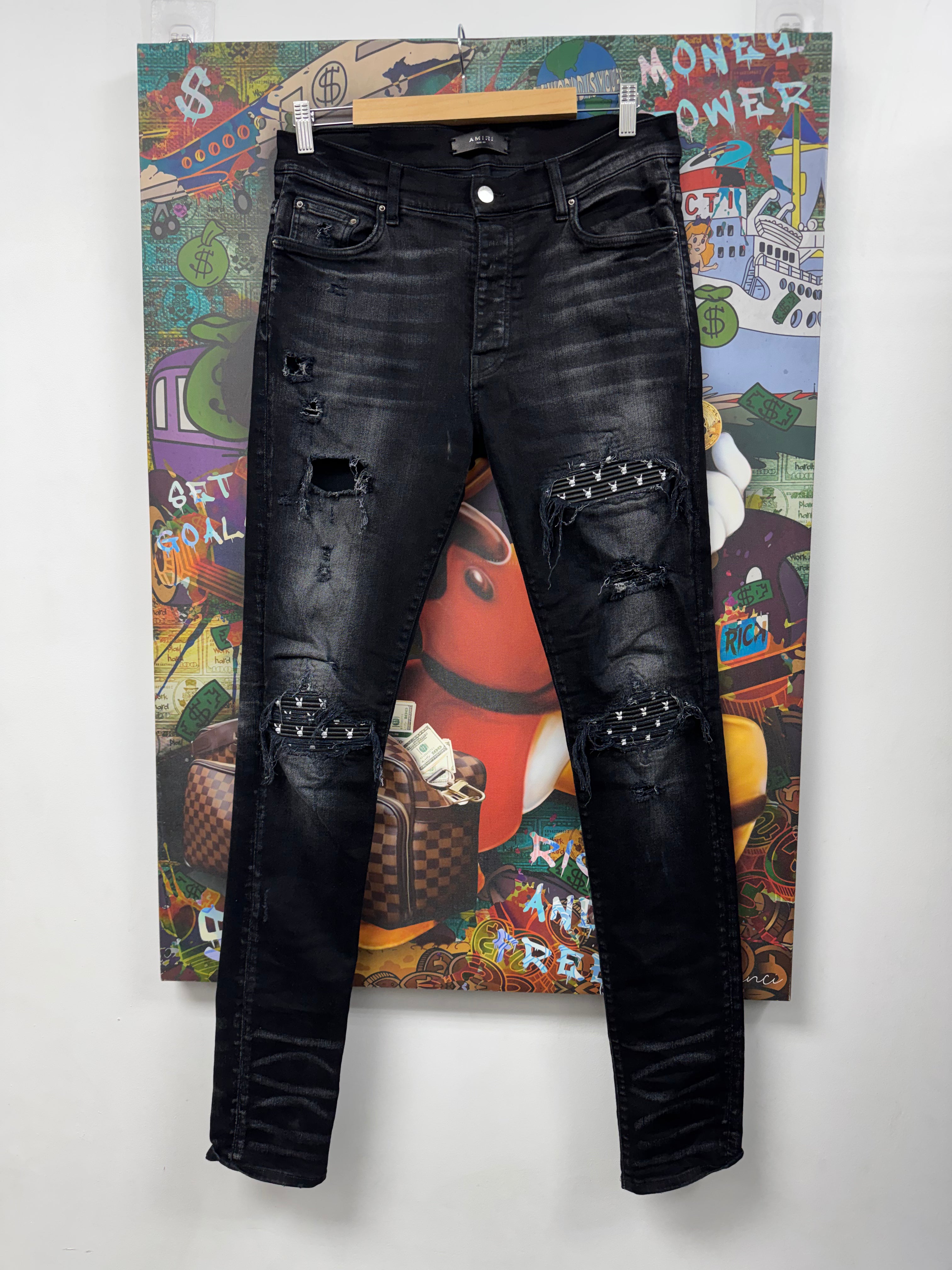 Amiri MX1 Black Wash Playboy Patch Jeans