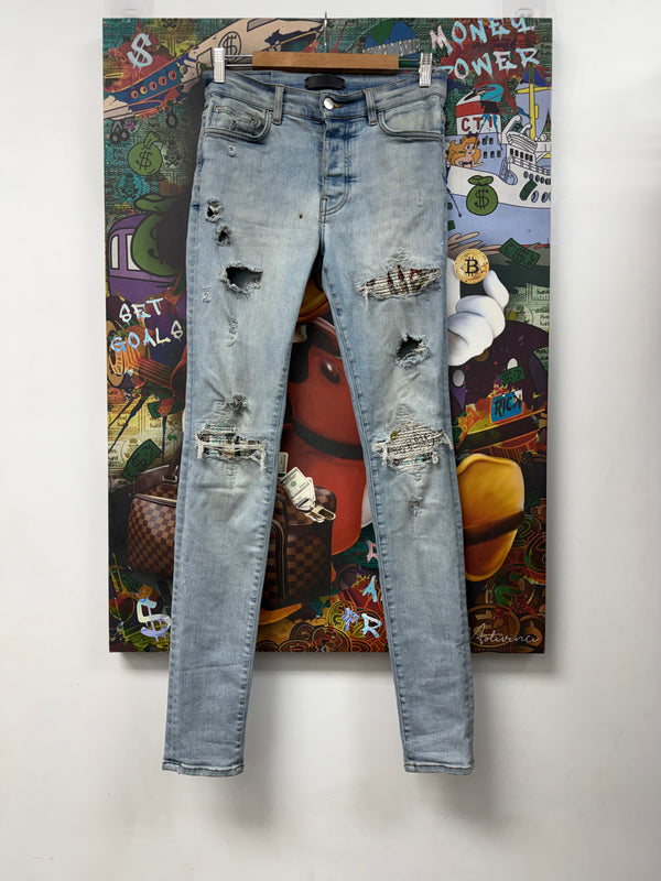 Amiri MX1 Light Wash Art Patch Jeans