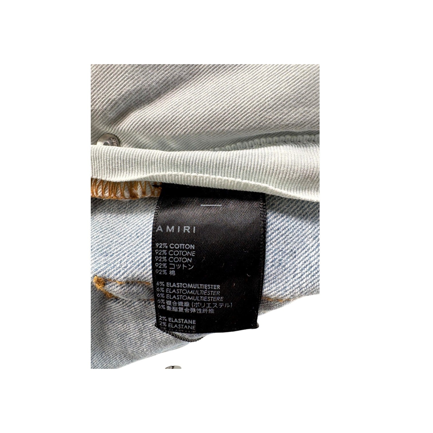 Amiri "MX1" Camo Patch Light Wash Jeans