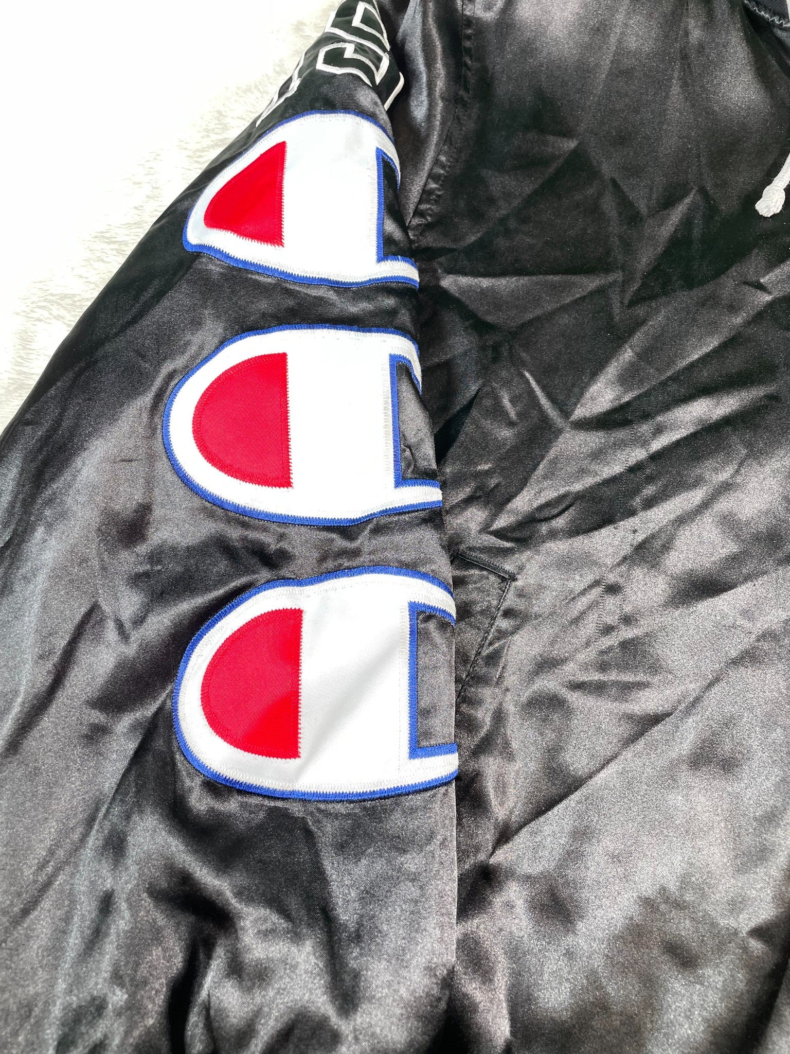 Supreme Champion Black Hooded Varsity Jacket