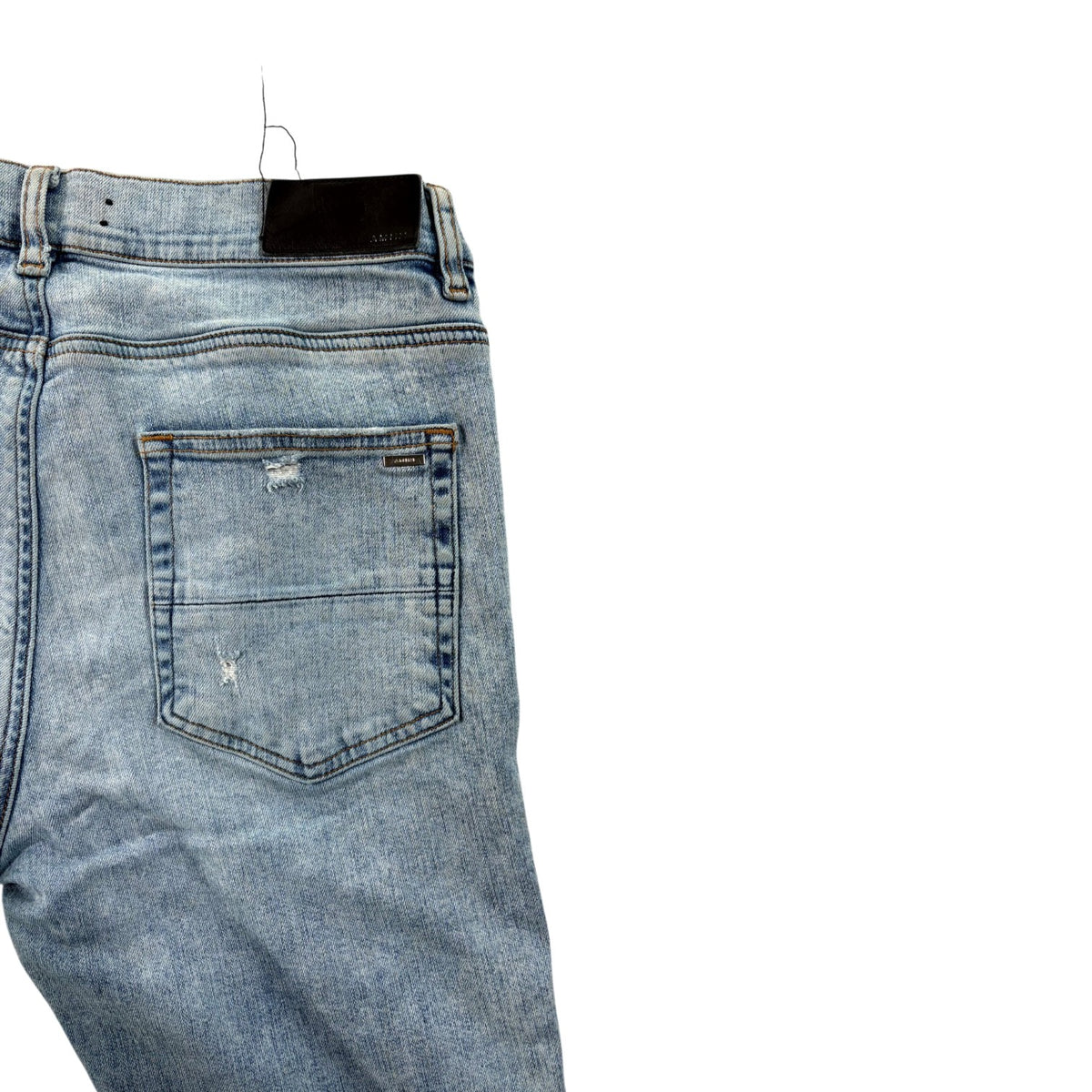 Amiri "MX1" Iridescent Light Wash Jeans