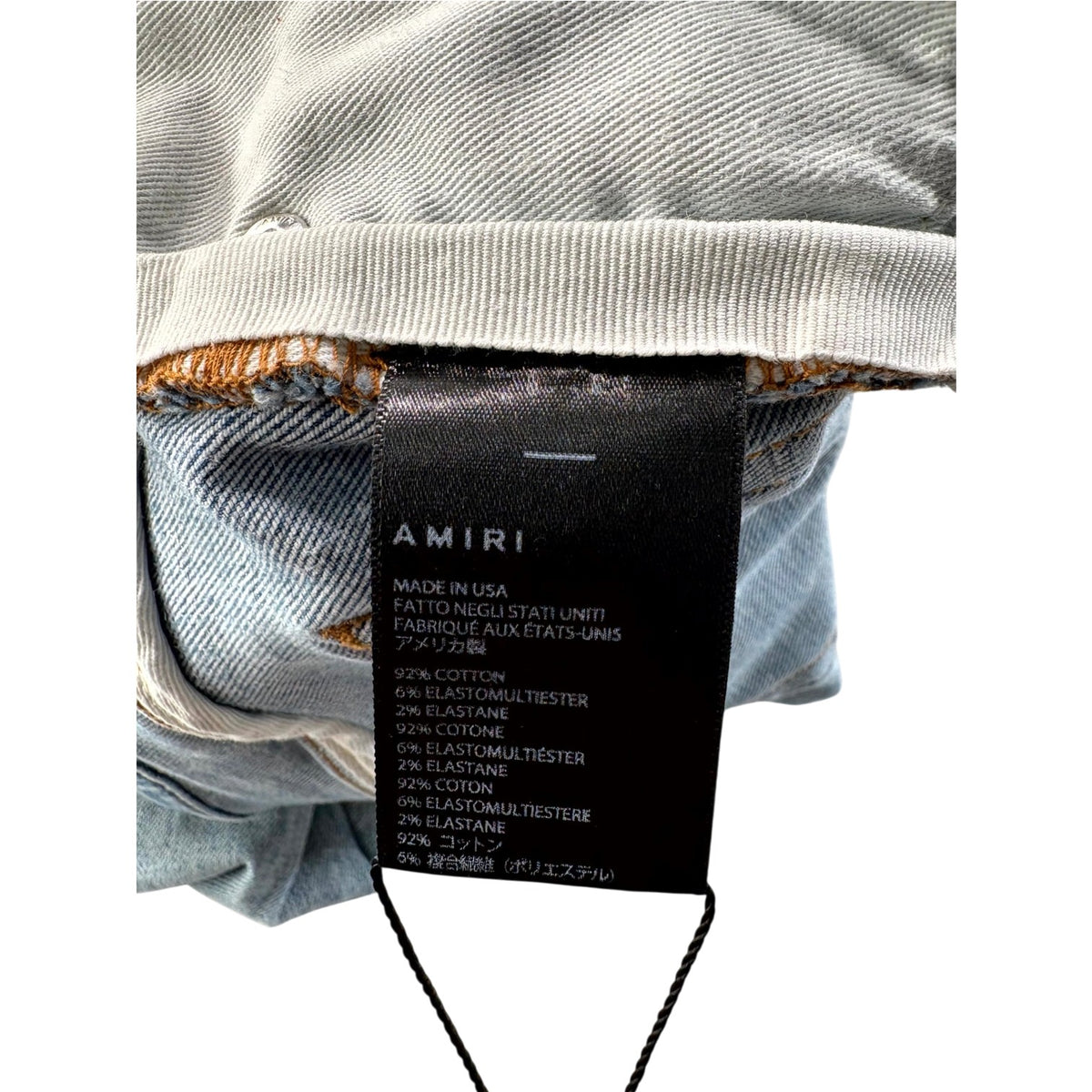 Amiri "MX1" Iridescent Light Wash Jeans