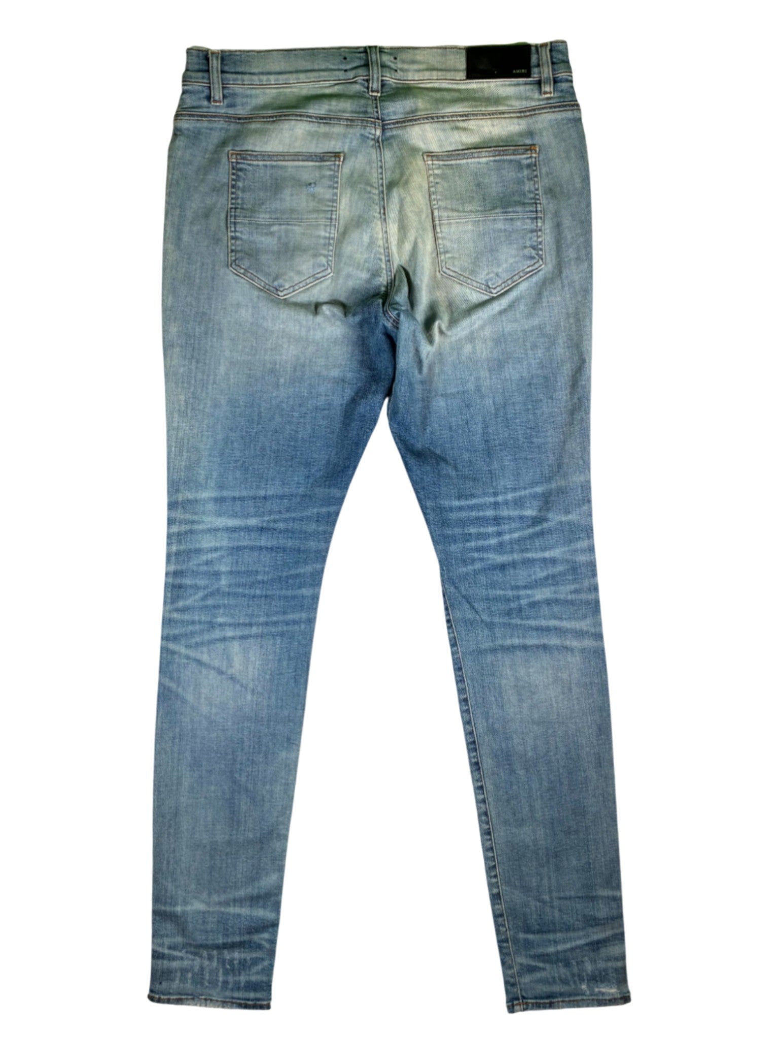 Amiri Stacked Ripped Light Wash Jeans