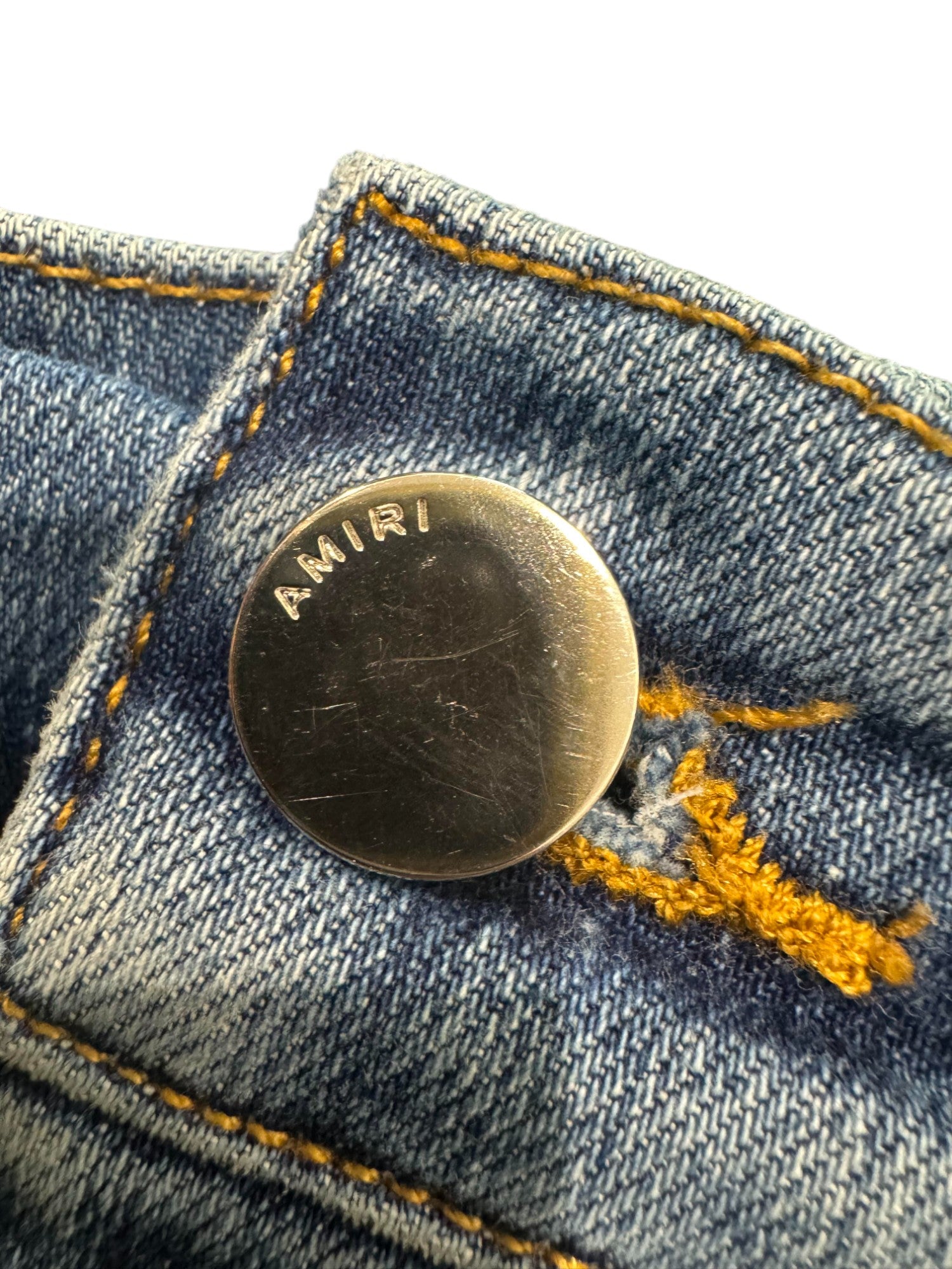 Amiri Knee Rip Light Wash Blue Jeans