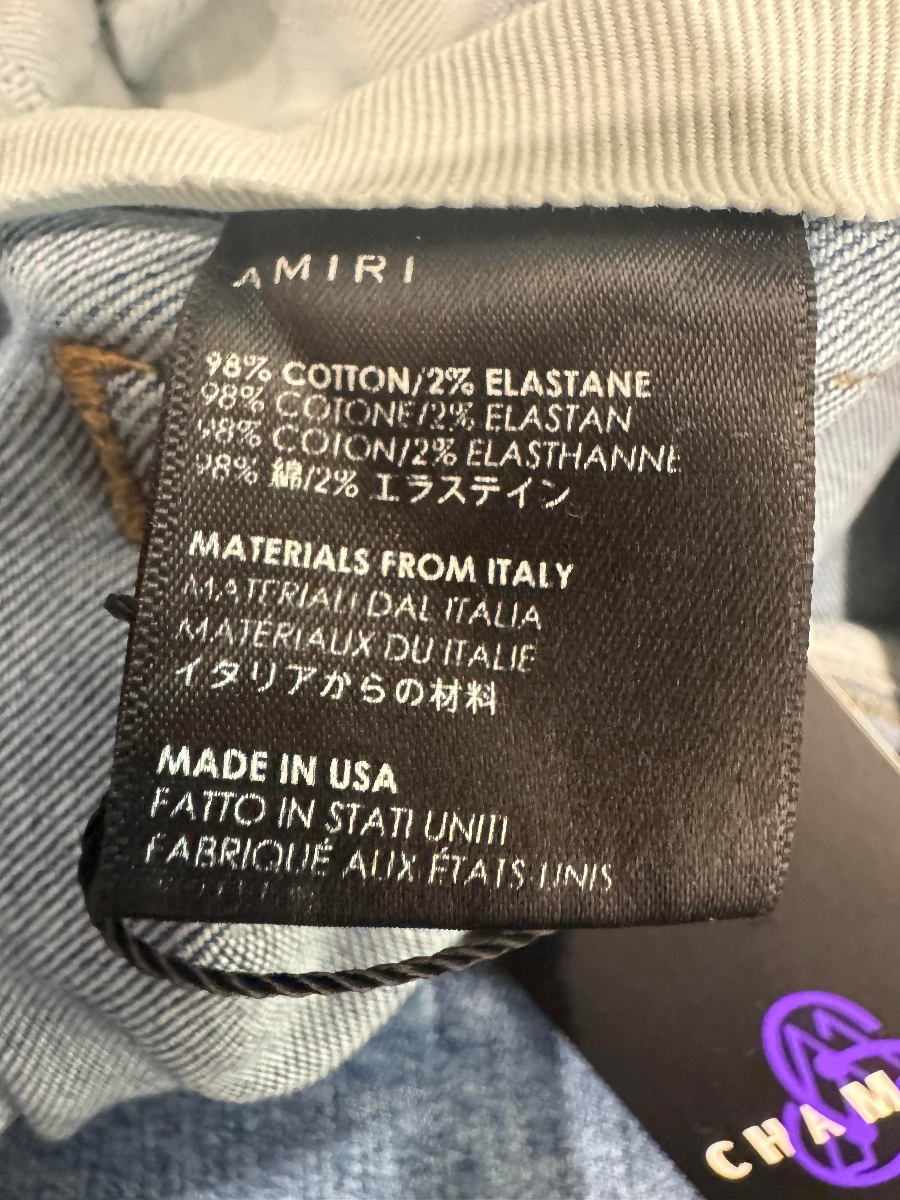 Amiri Knee Rip Light Wash Blue Jeans