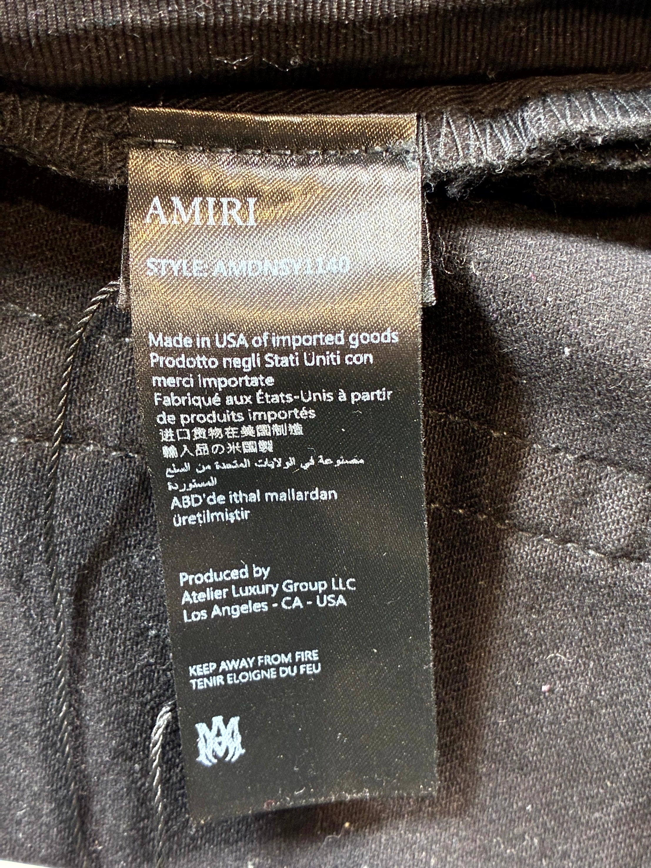 Amiri Wax Staggered Side Logo Black Jeans