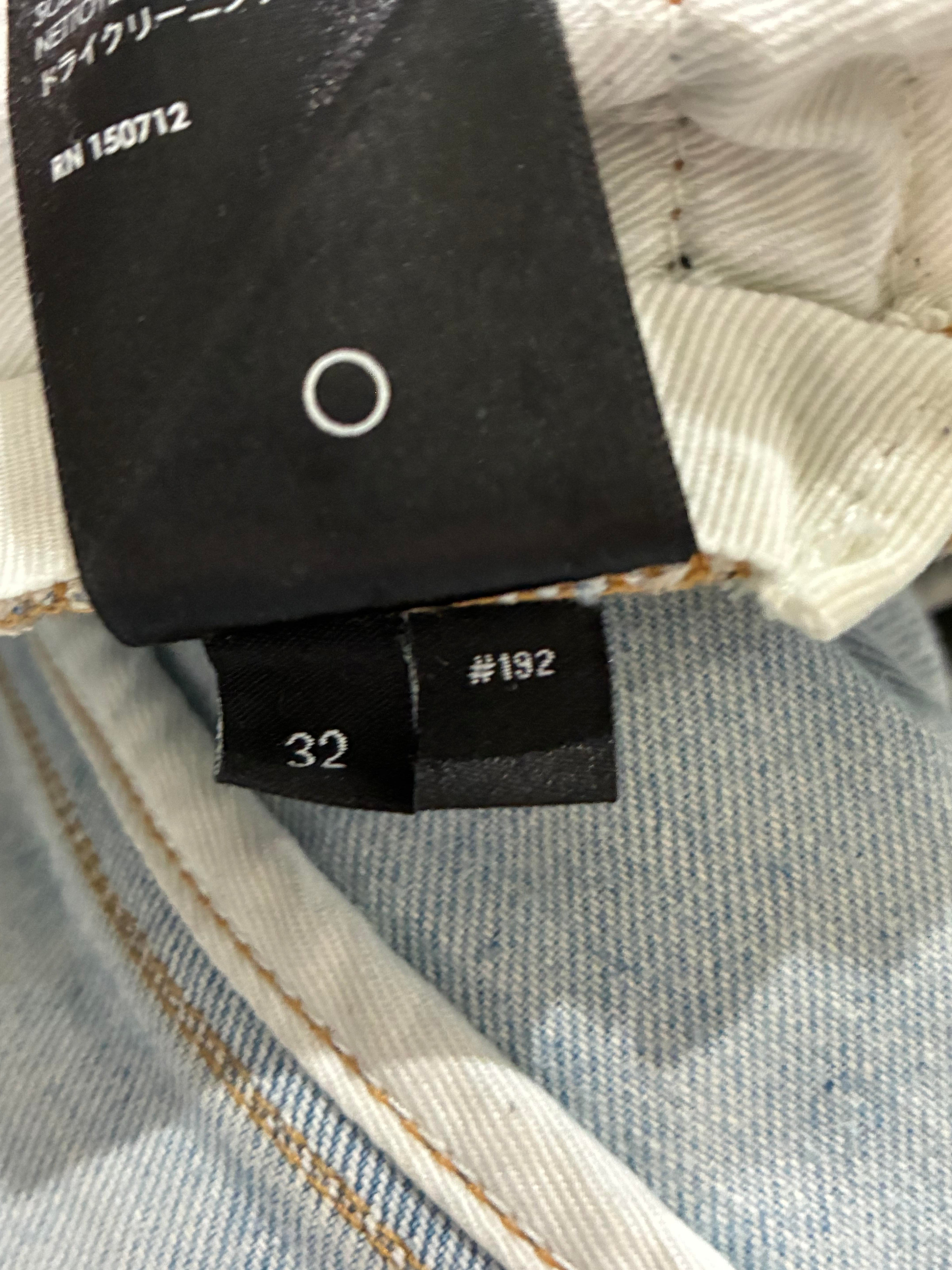 Amiri Ripped Thrasher Jeans
