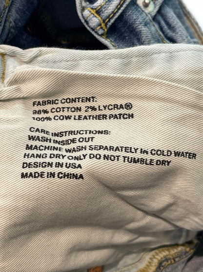 Purple Brand Light Wash Ripped Jeans