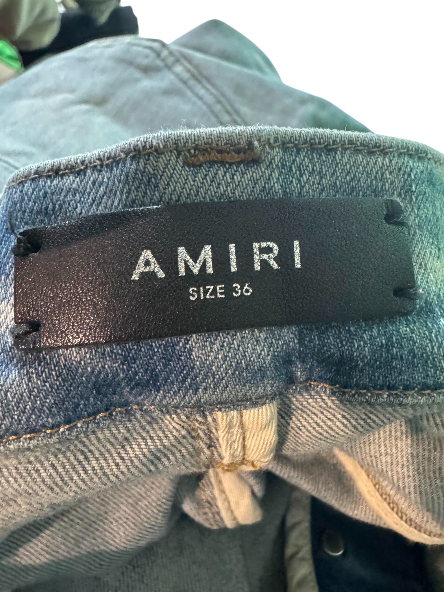 Amiri MX1 Light Wash, Blue & Red Patch Jeans