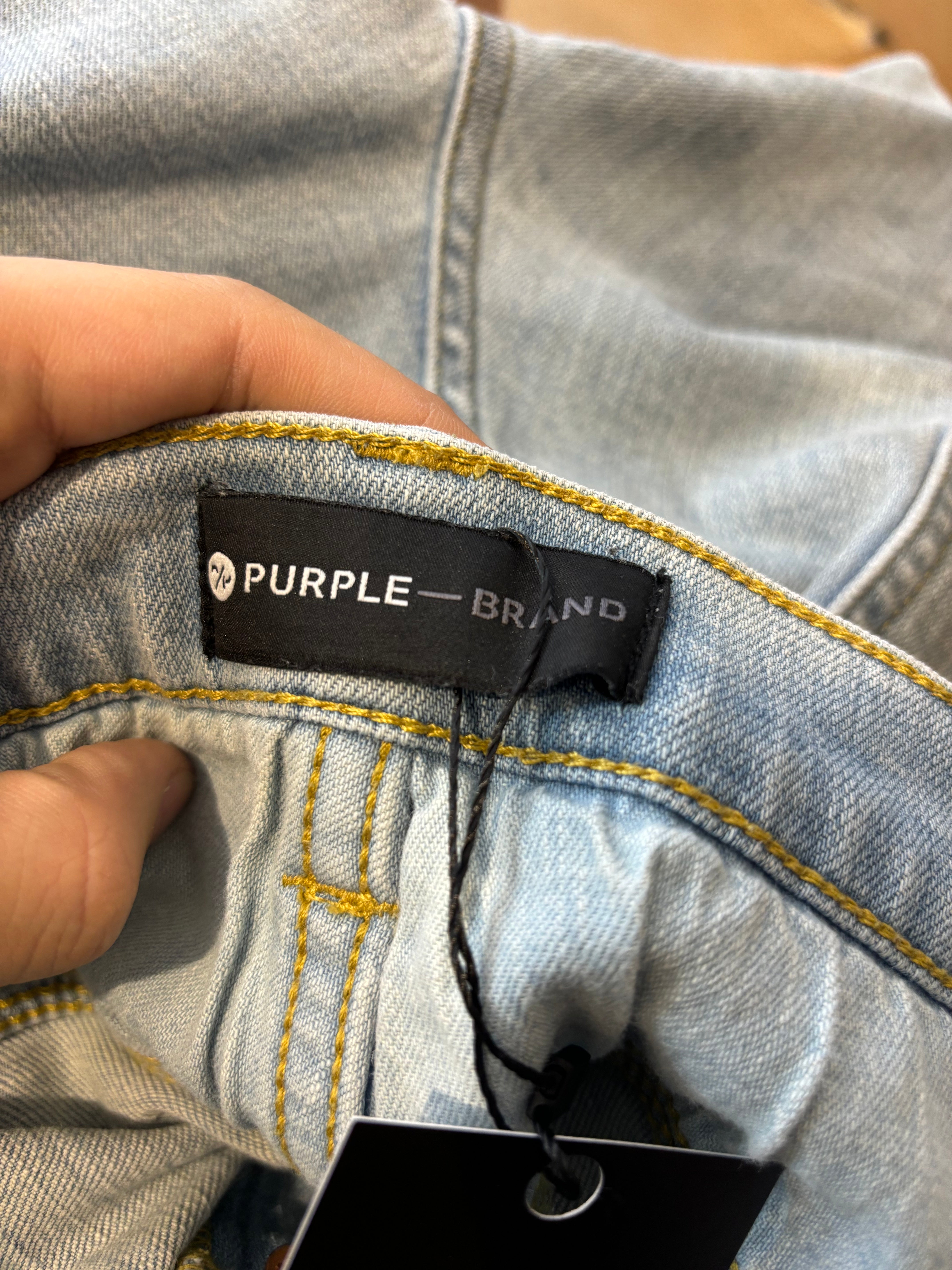 Purple Brand Light Wash Ripped Jeans