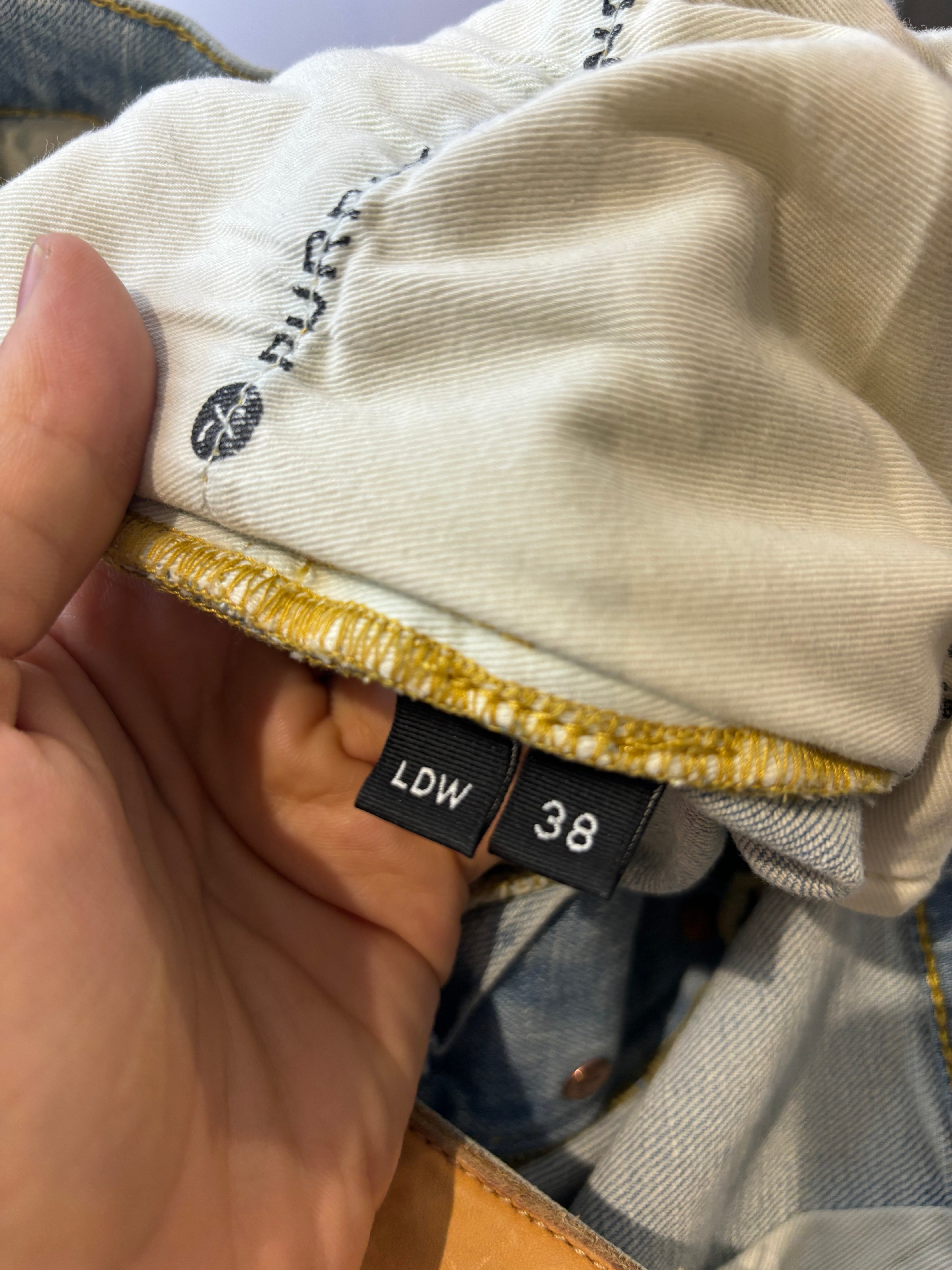 Purple Brand Light Wash Ripped Jeans