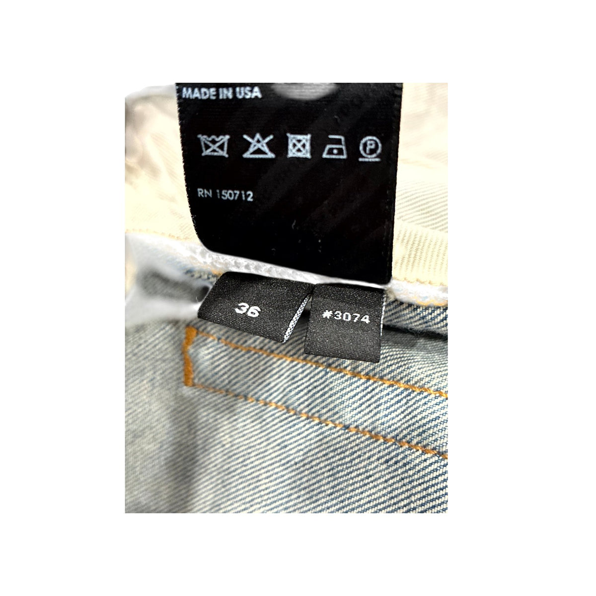 Amiri Honeycomb Tie Dye Thrasher Patch Light Wash Jeans