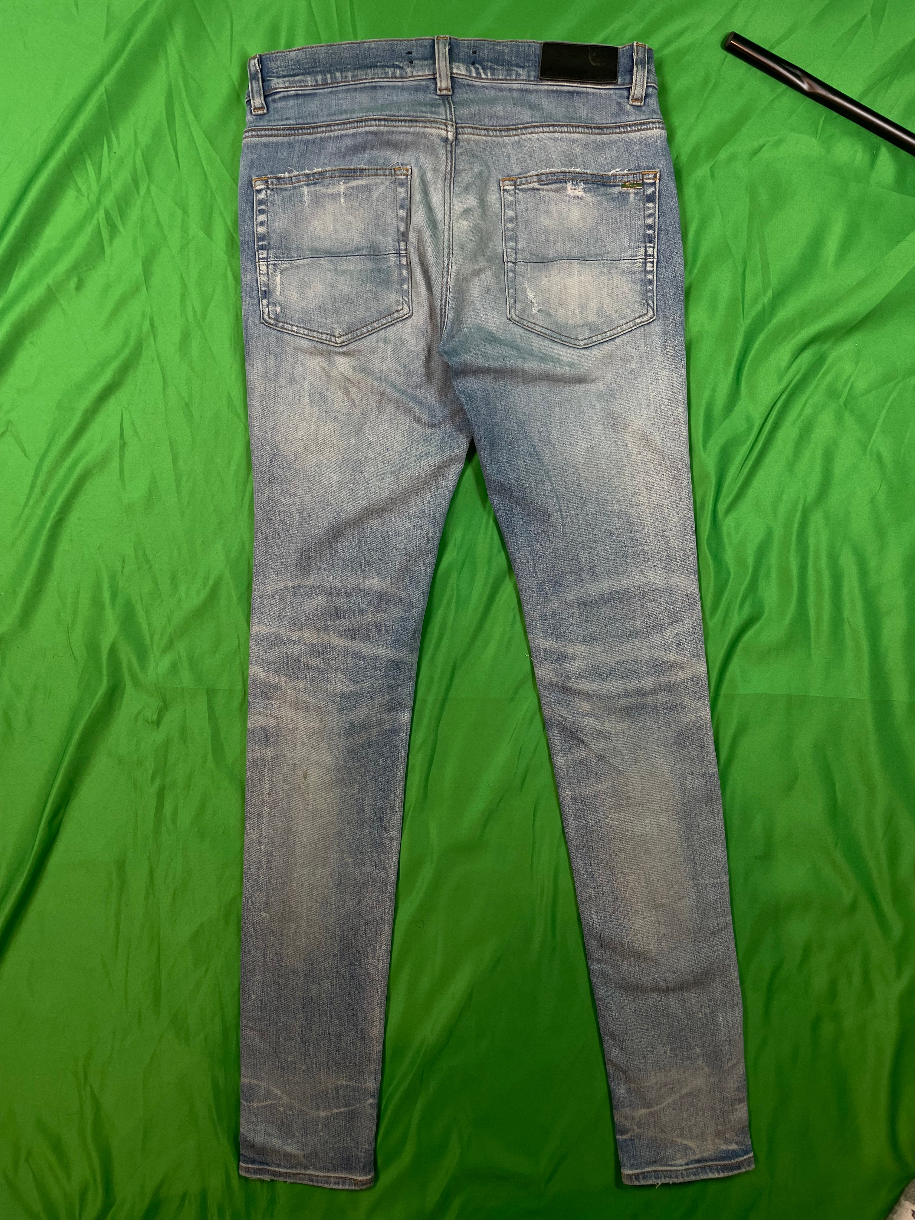 Amiri MX1 Orange Crackle Patch Light Wash Blue Jeans